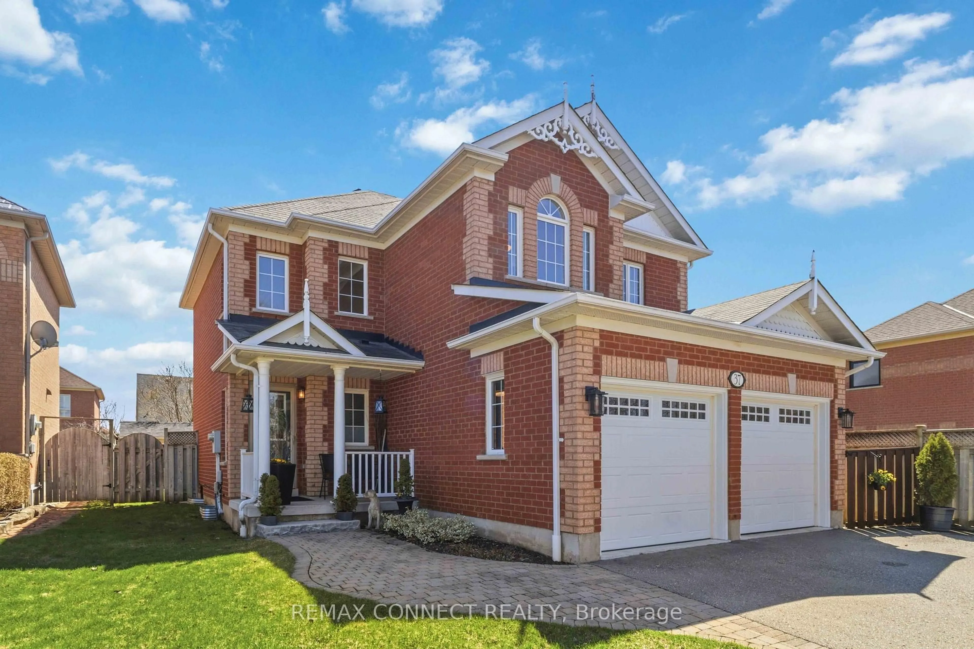 Home with brick exterior material, street for 37 Duggan Ave, Whitby Ontario L1M 1J1