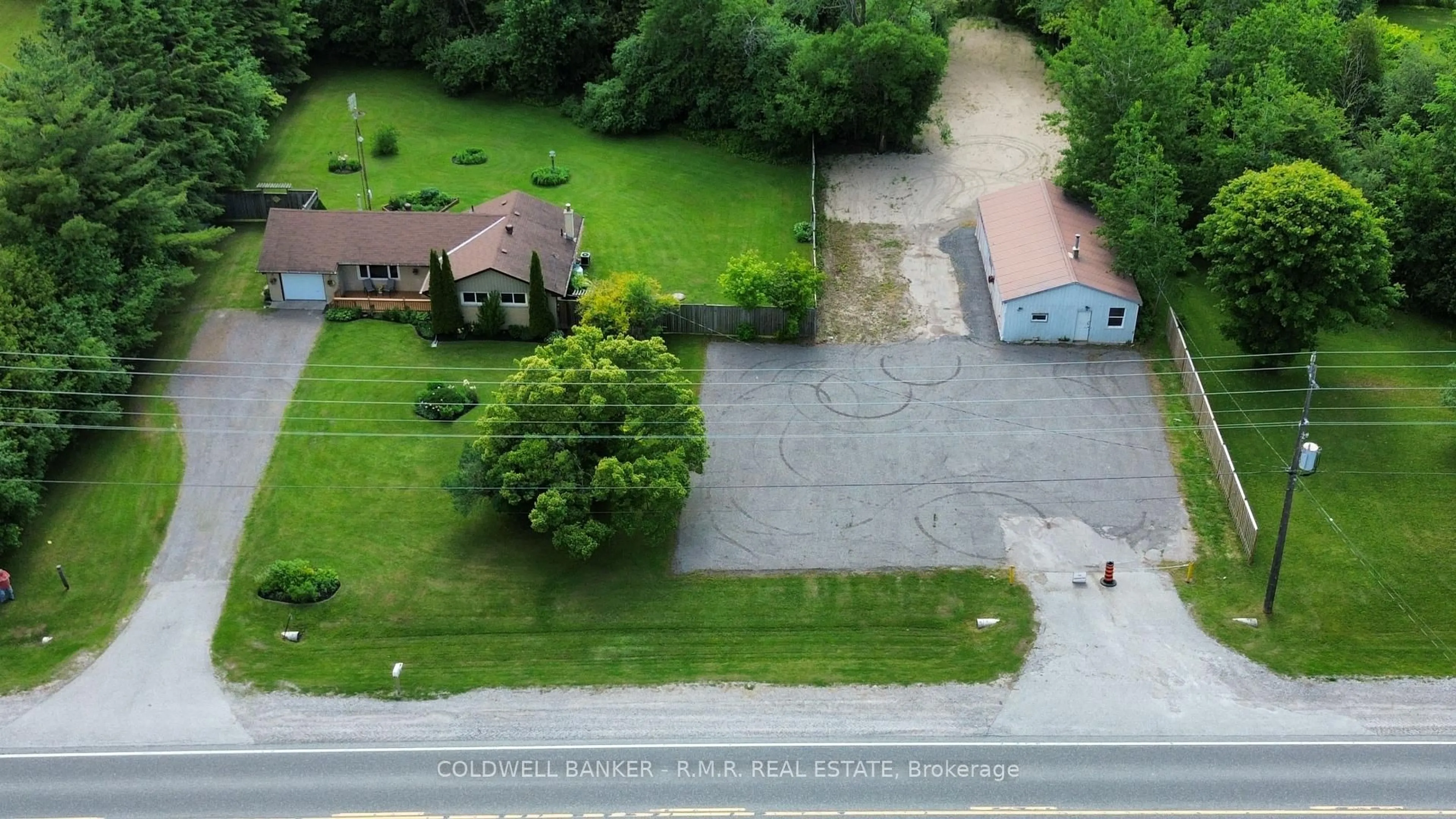 A pic from outside/outdoor area/front of a property/back of a property/a pic from drone, street for 14550 Regional Road 57 Rd, Scugog Ontario L0B 1B0