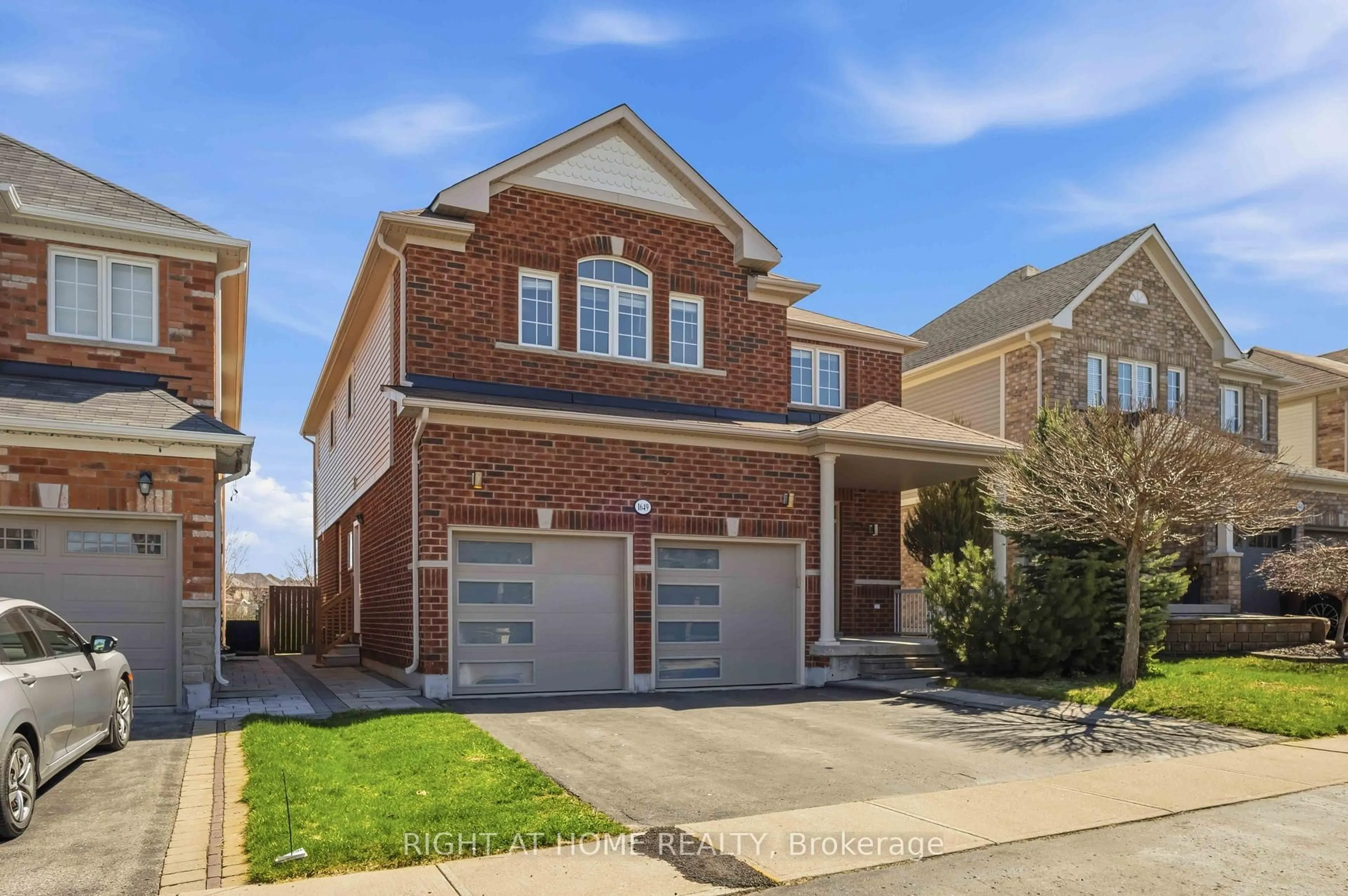 Home with brick exterior material, street for 1649 Quail Run Dr, Oshawa Ontario L1K 0L9
