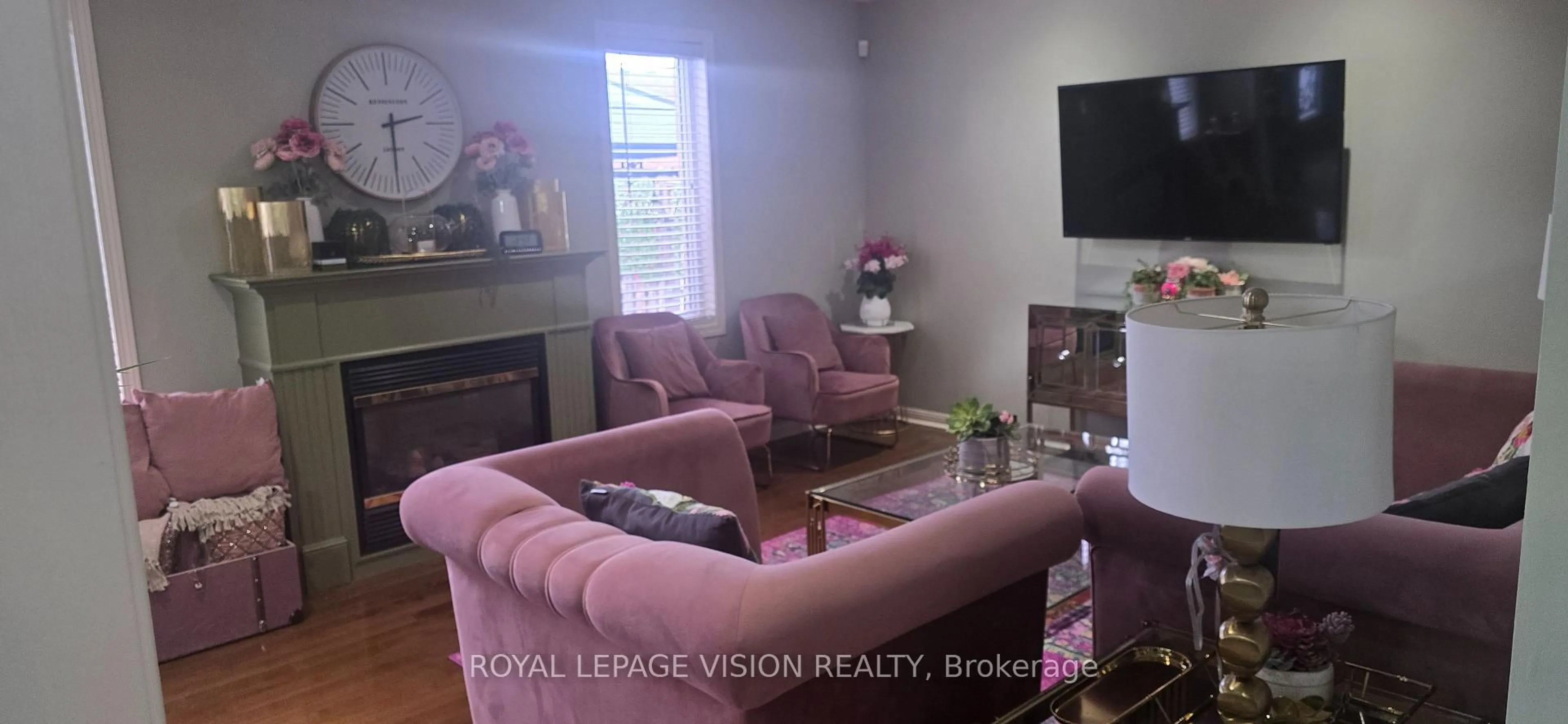 Living room with furniture, wood/laminate floor for 122 Medland Ave, Whitby Ontario L1P 1W7