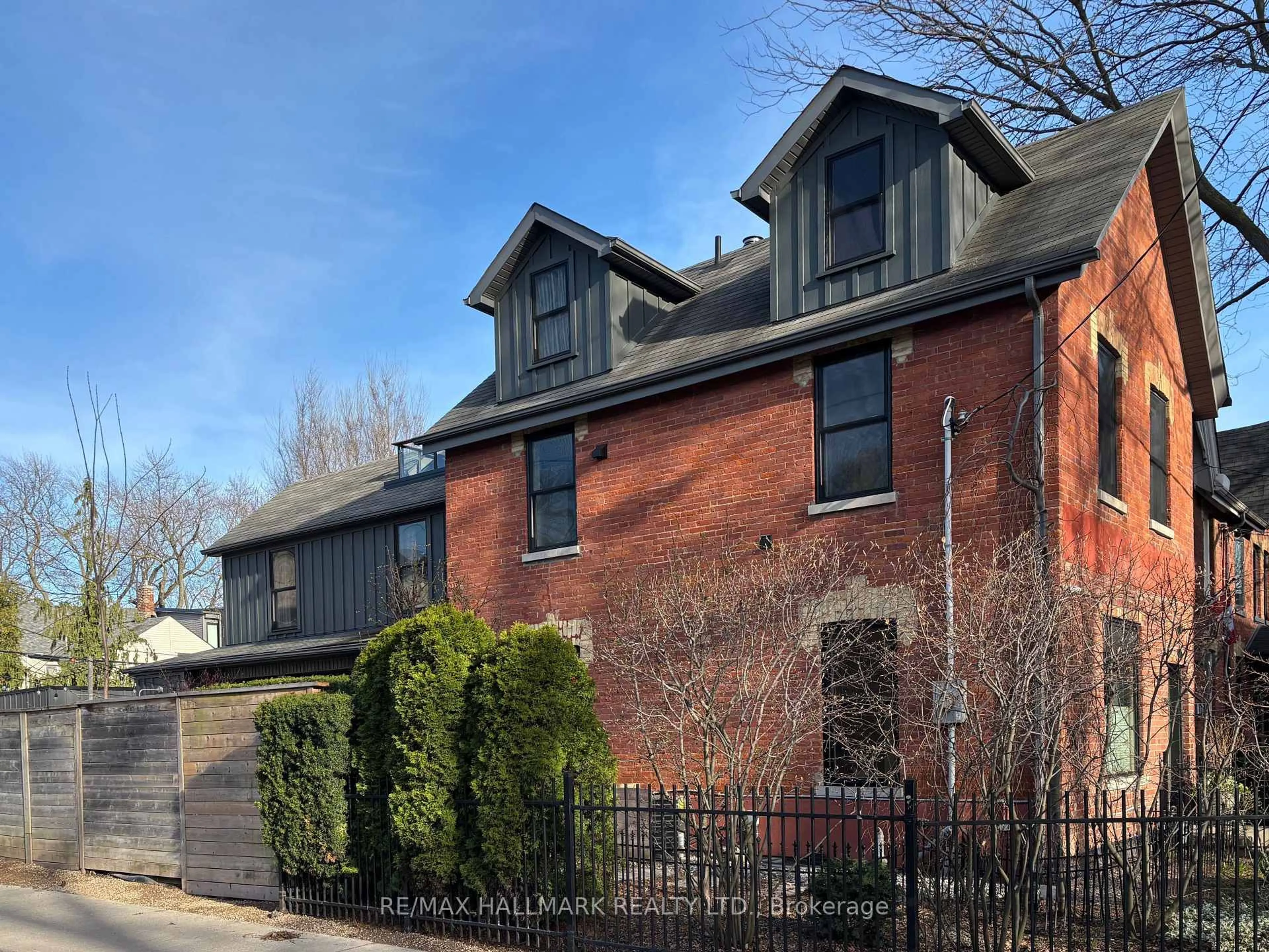Home with brick exterior material, street for 235 Boulton Ave, Toronto Ontario M4M 2J8