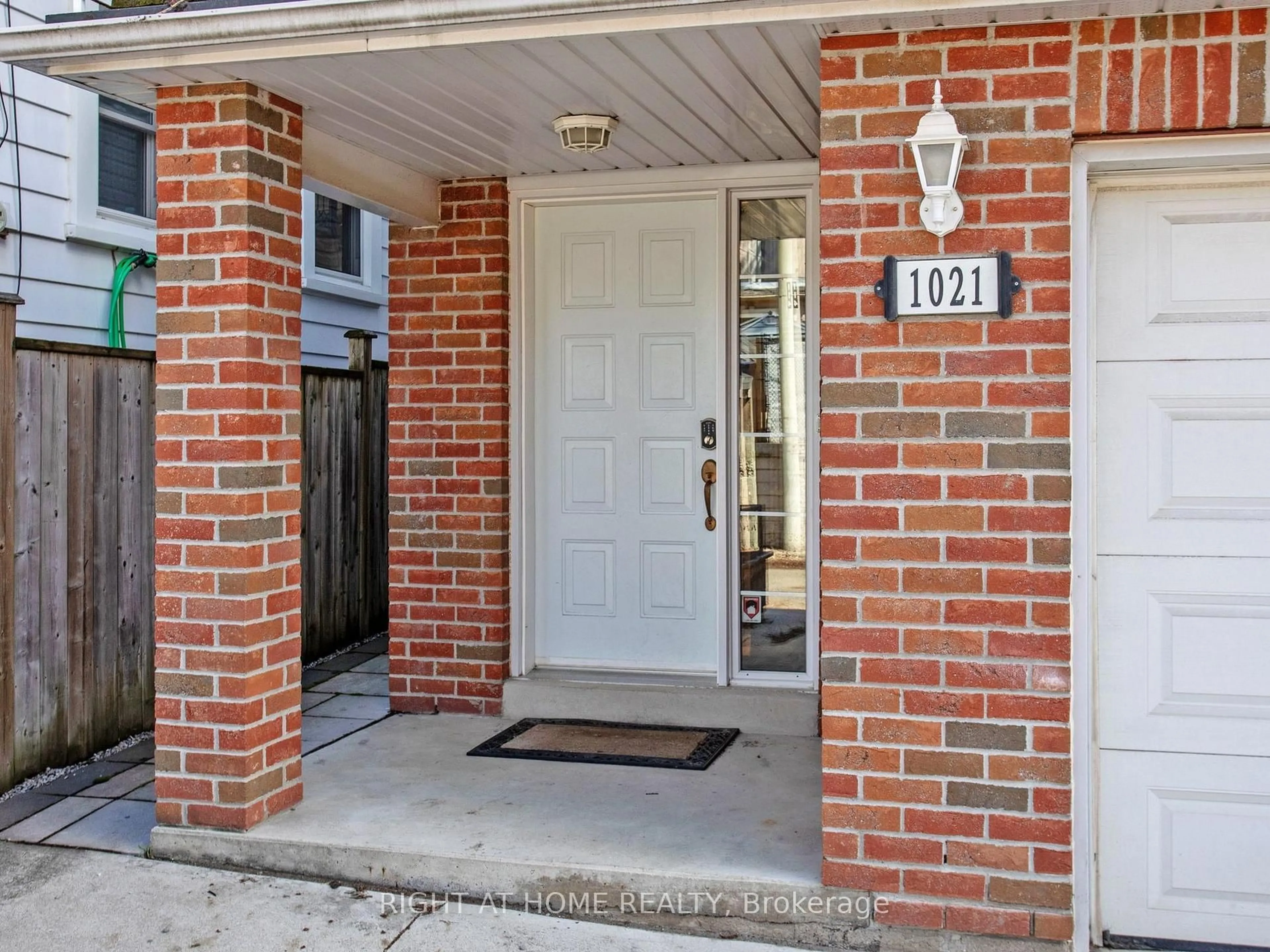 Home with brick exterior material, street for 1021 Craven Rd, Toronto Ontario M4J 4V7