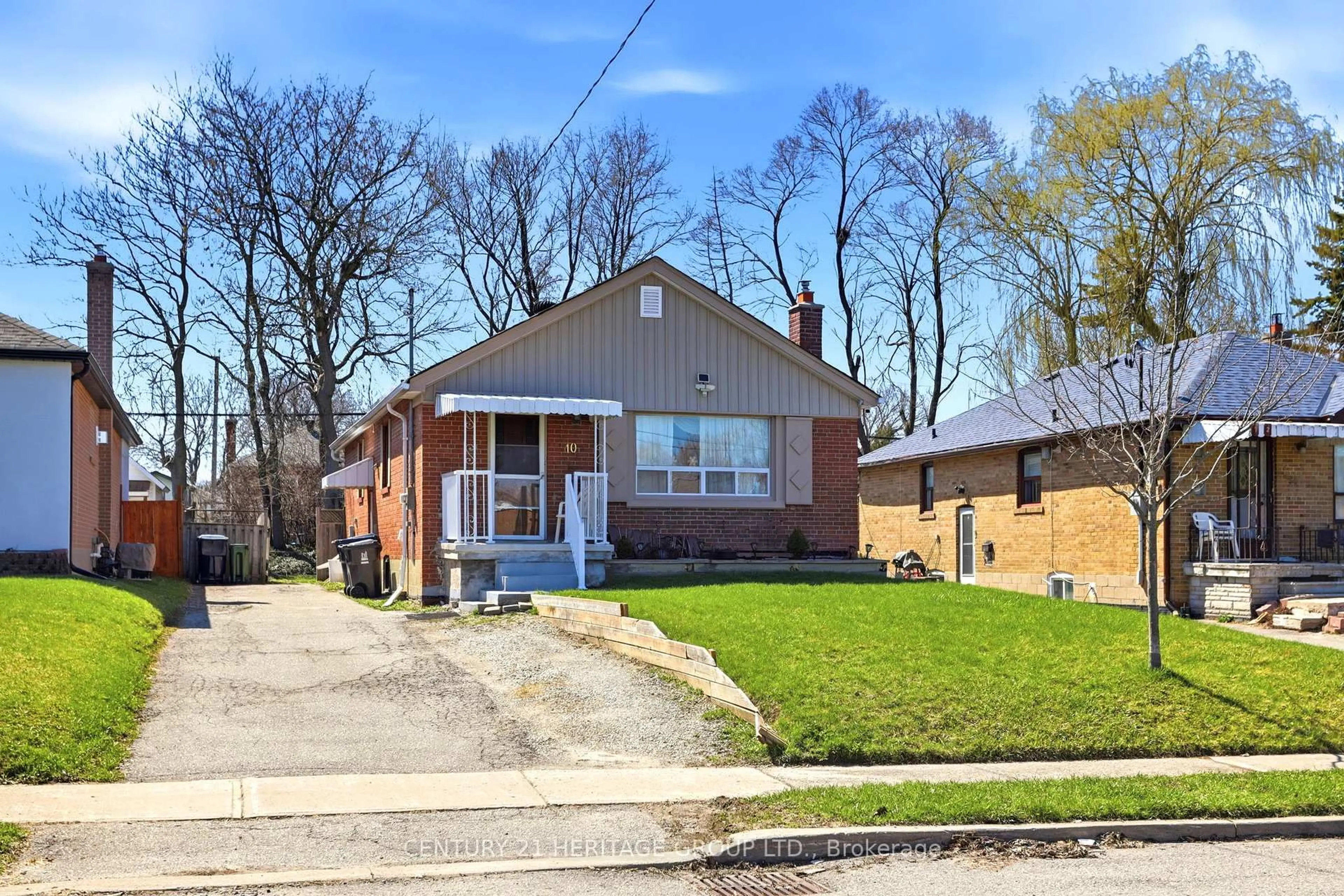 Home with brick exterior material, street for 10 Garthwood Dr, Toronto Ontario M1K 2J5