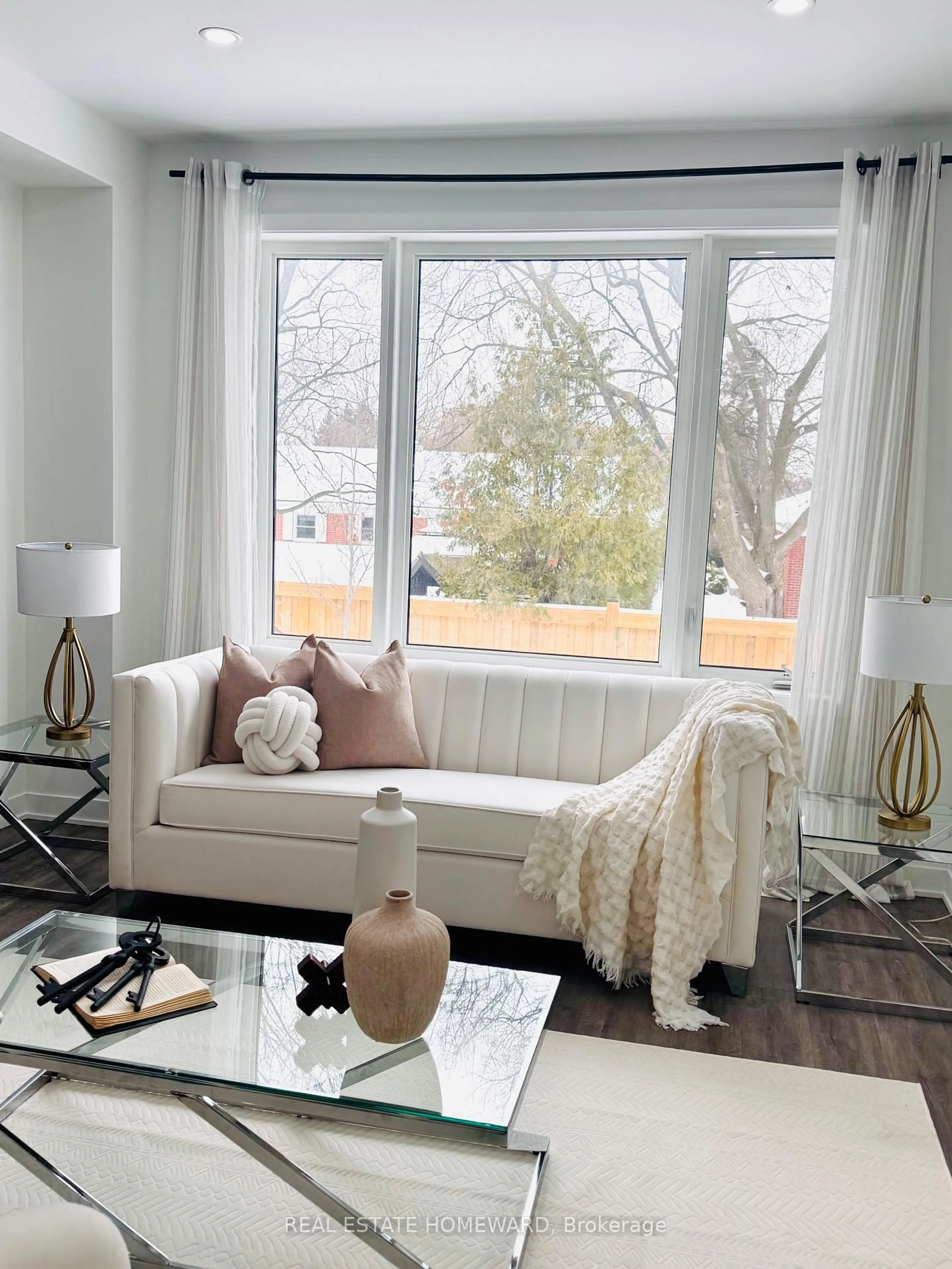 Living room with furniture, wood/laminate floor for 30 Frank Lloyd Wright St, Whitby Ontario L1N 0N9