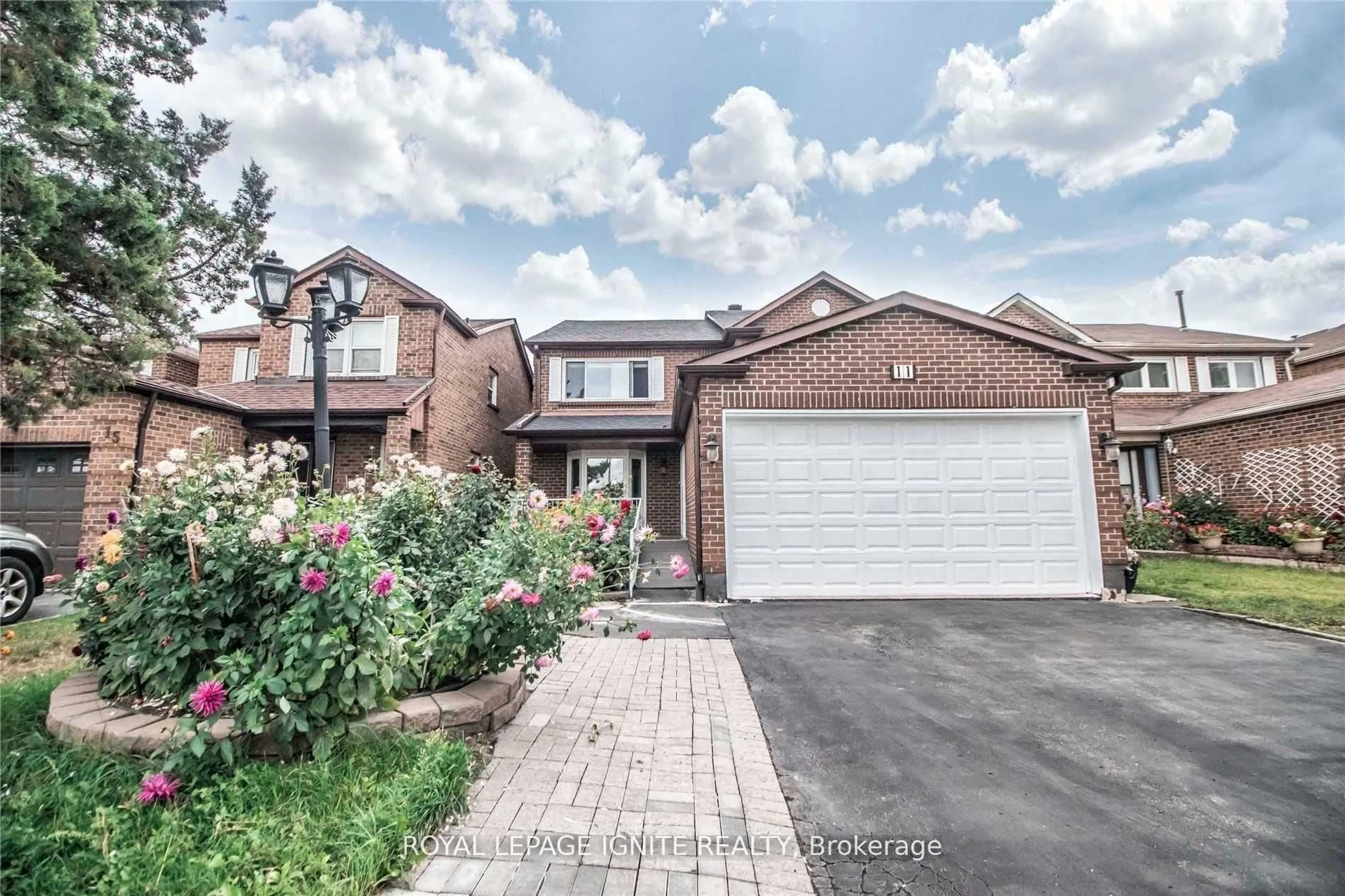 Home with brick exterior material, street for 11 Carisbrooke Sq, Toronto Ontario M1B 4M2