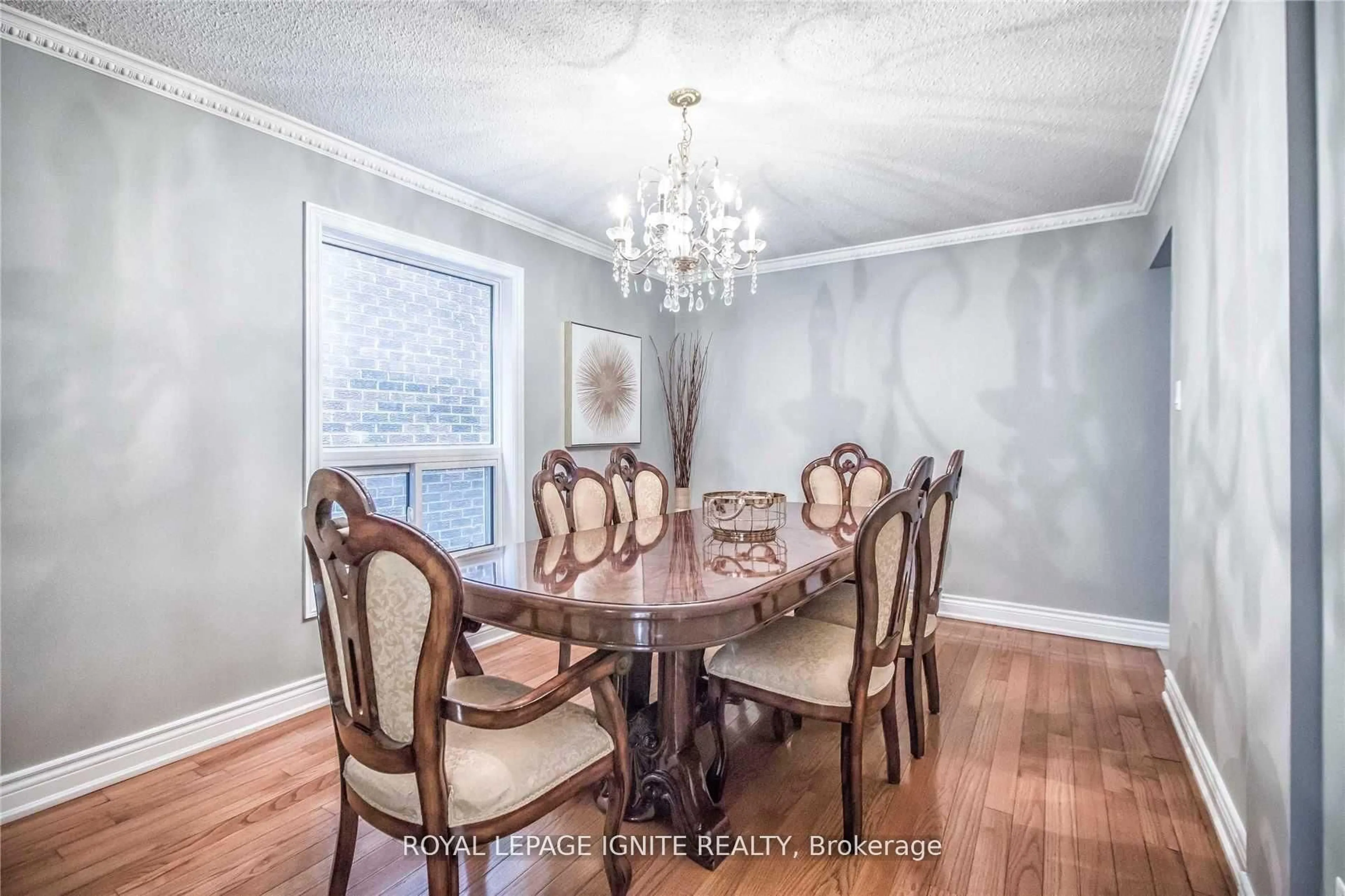 Dining room, wood/laminate floor for 11 Carisbrooke Sq, Toronto Ontario M1B 4M2