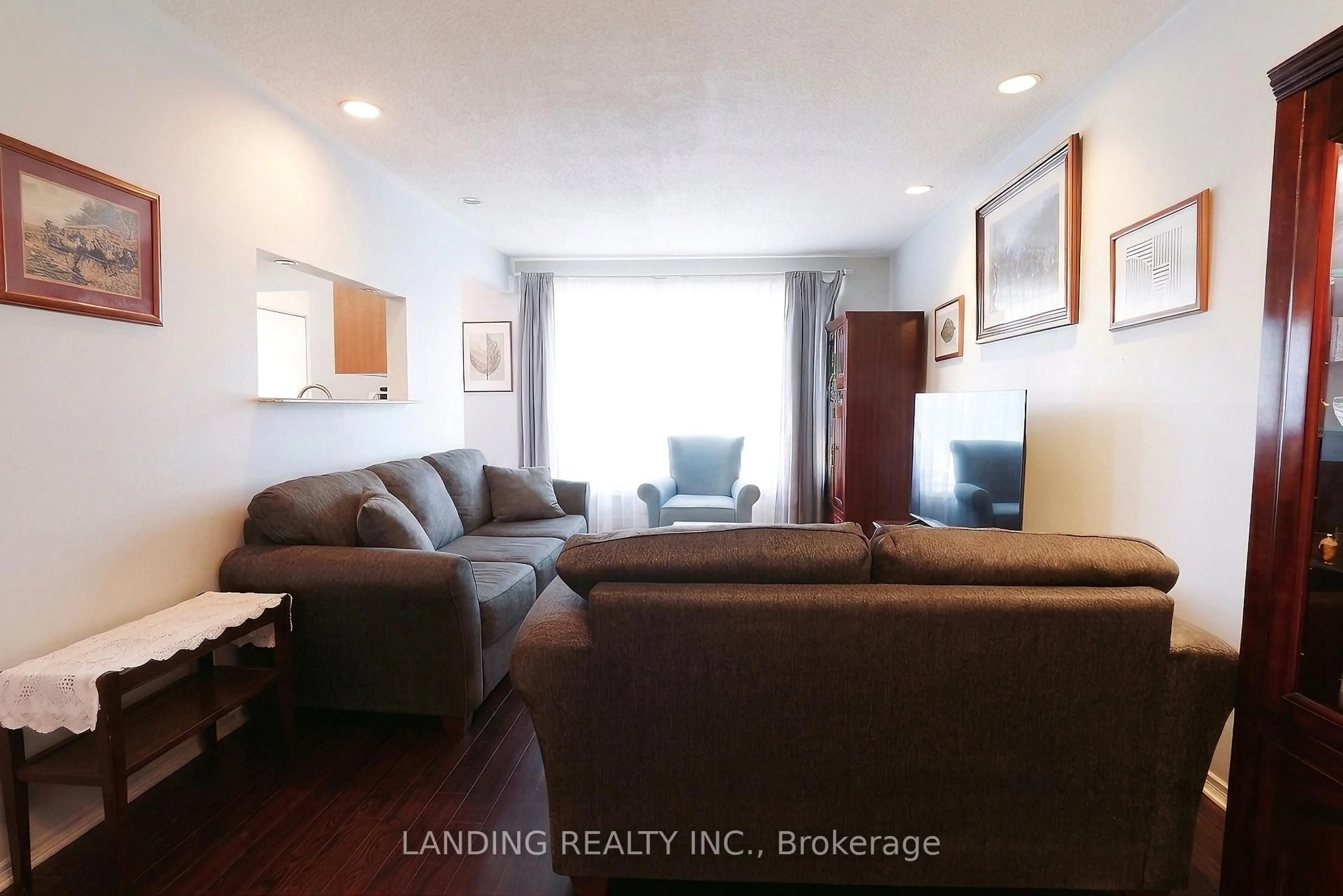 Living room with furniture, wood/laminate floor for 1391 Tatra Dr, Pickering Ontario L1W 1K7