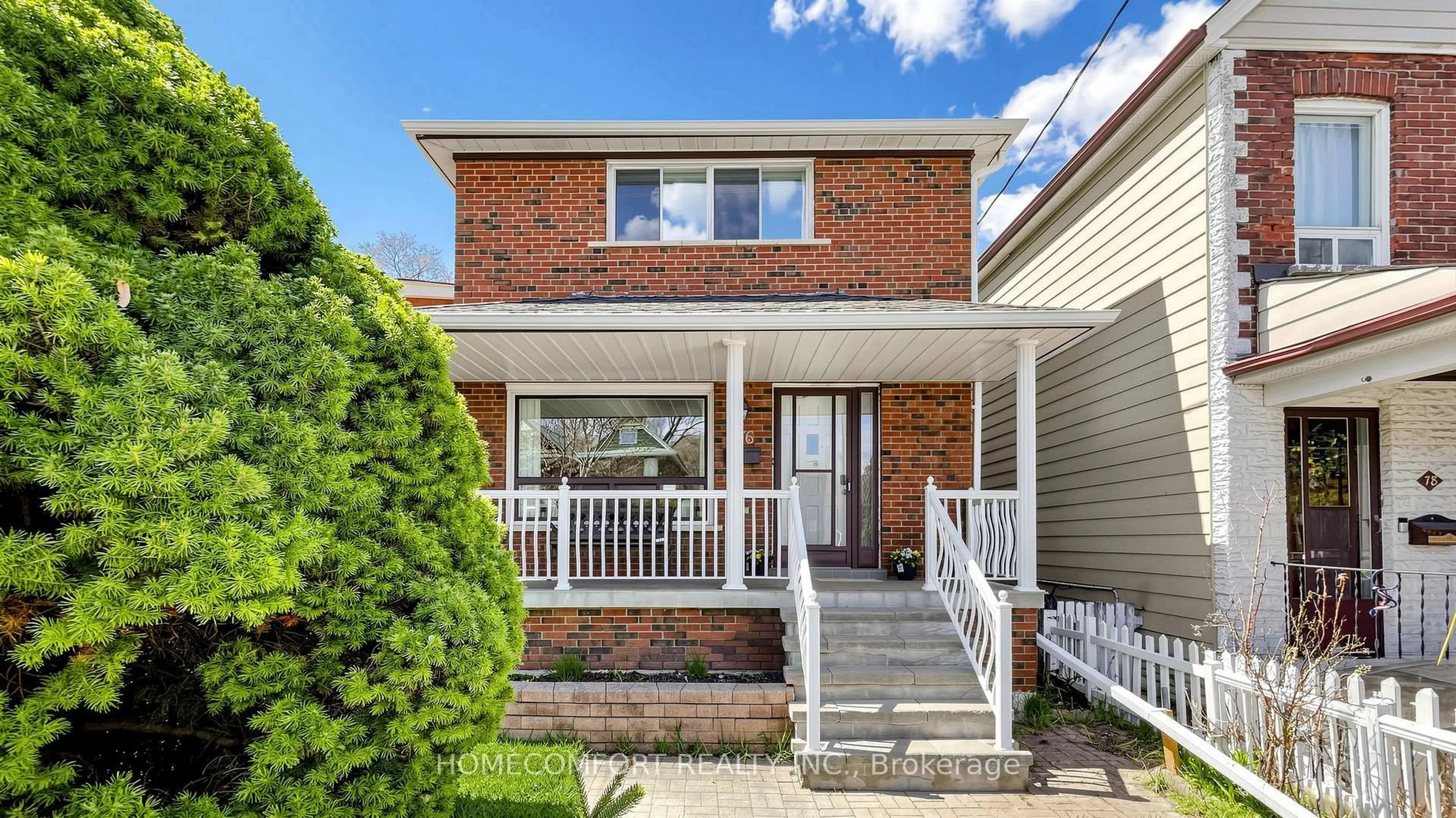 Home with brick exterior material, street for 76 Barrington Ave, Toronto Ontario M4C 4Z1