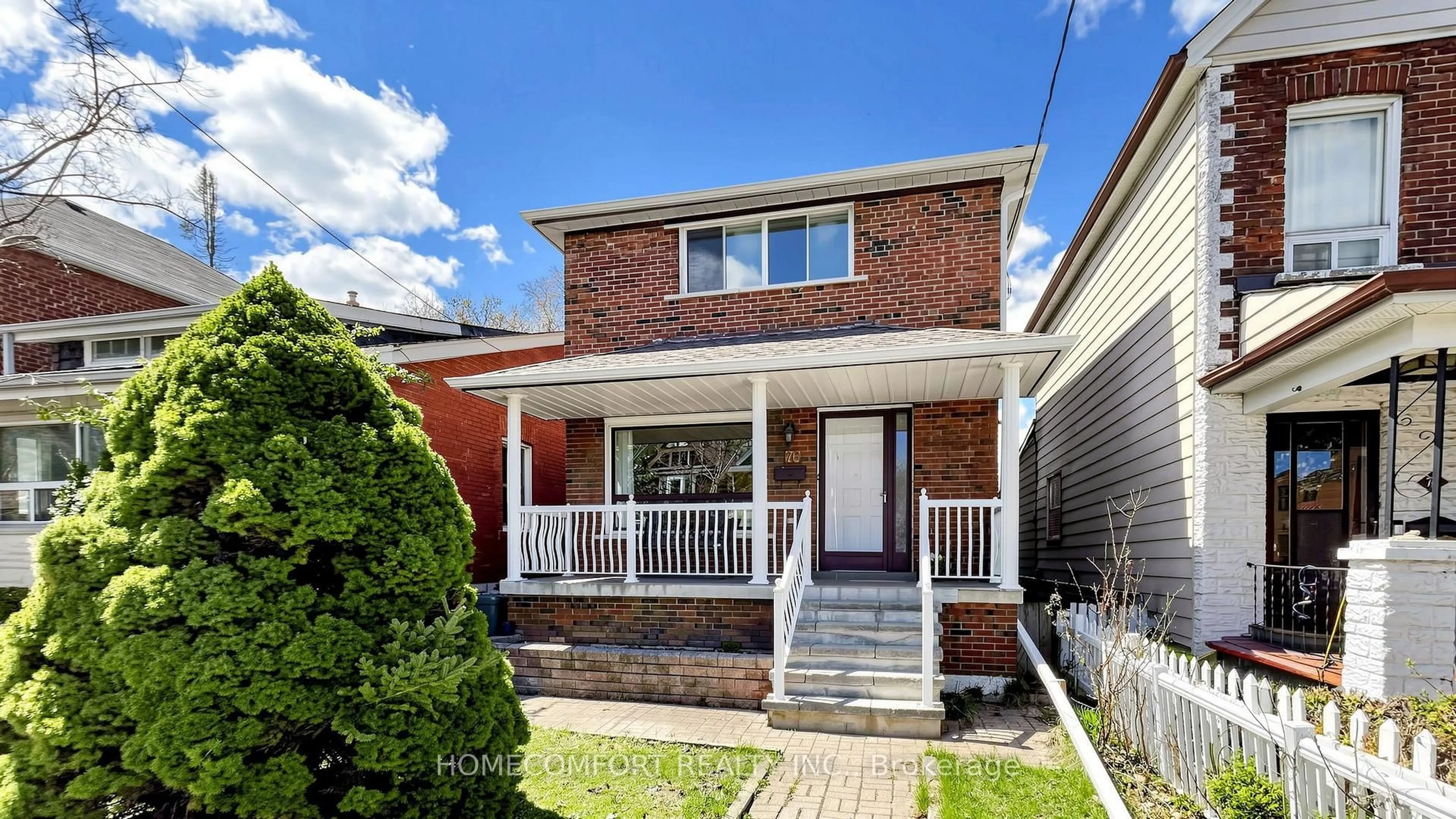 Home with brick exterior material, street for 76 Barrington Ave, Toronto Ontario M4C 4Z1
