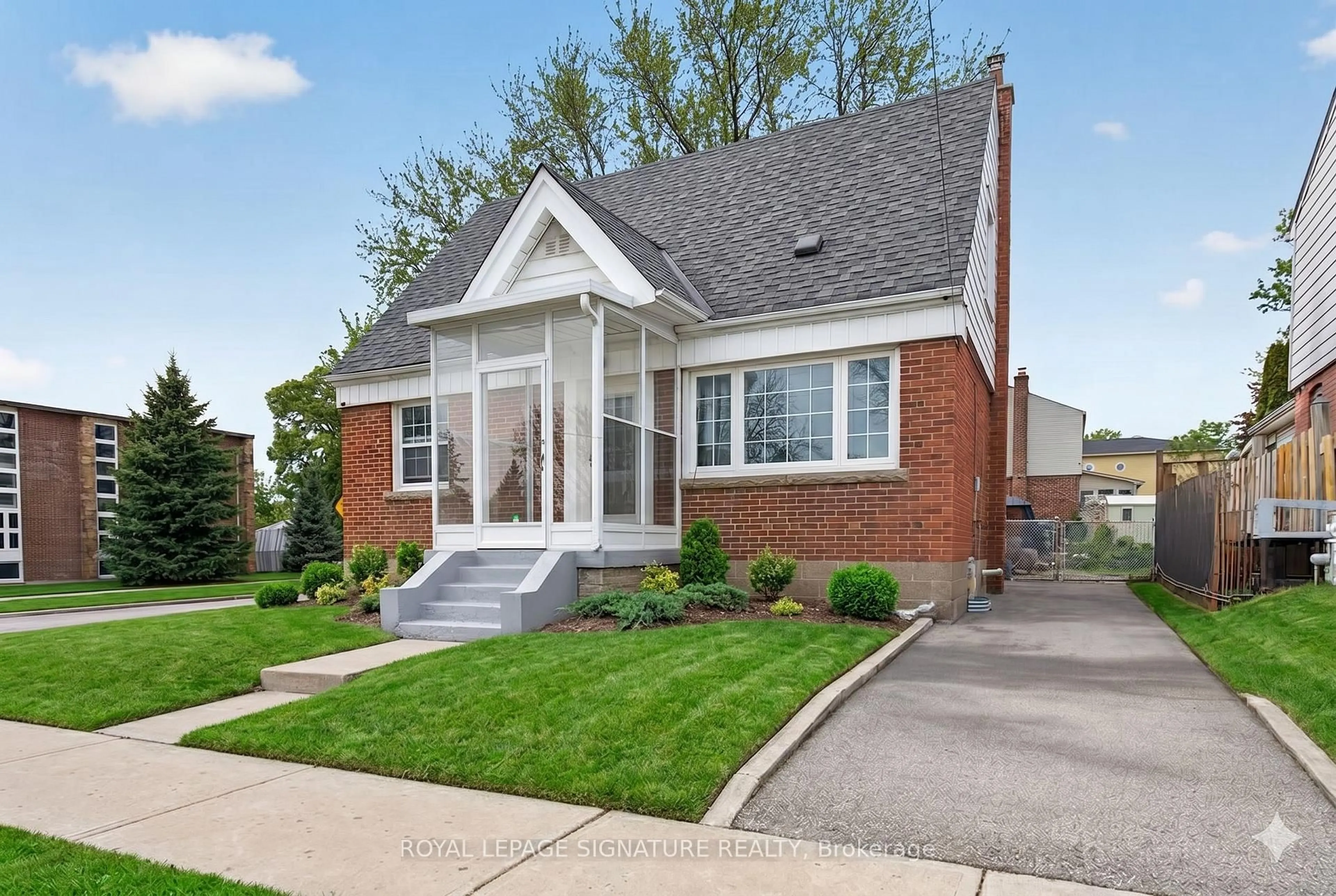 Home with brick exterior material, street for 3244 St Clair Ave, Toronto Ontario M1L 1V8