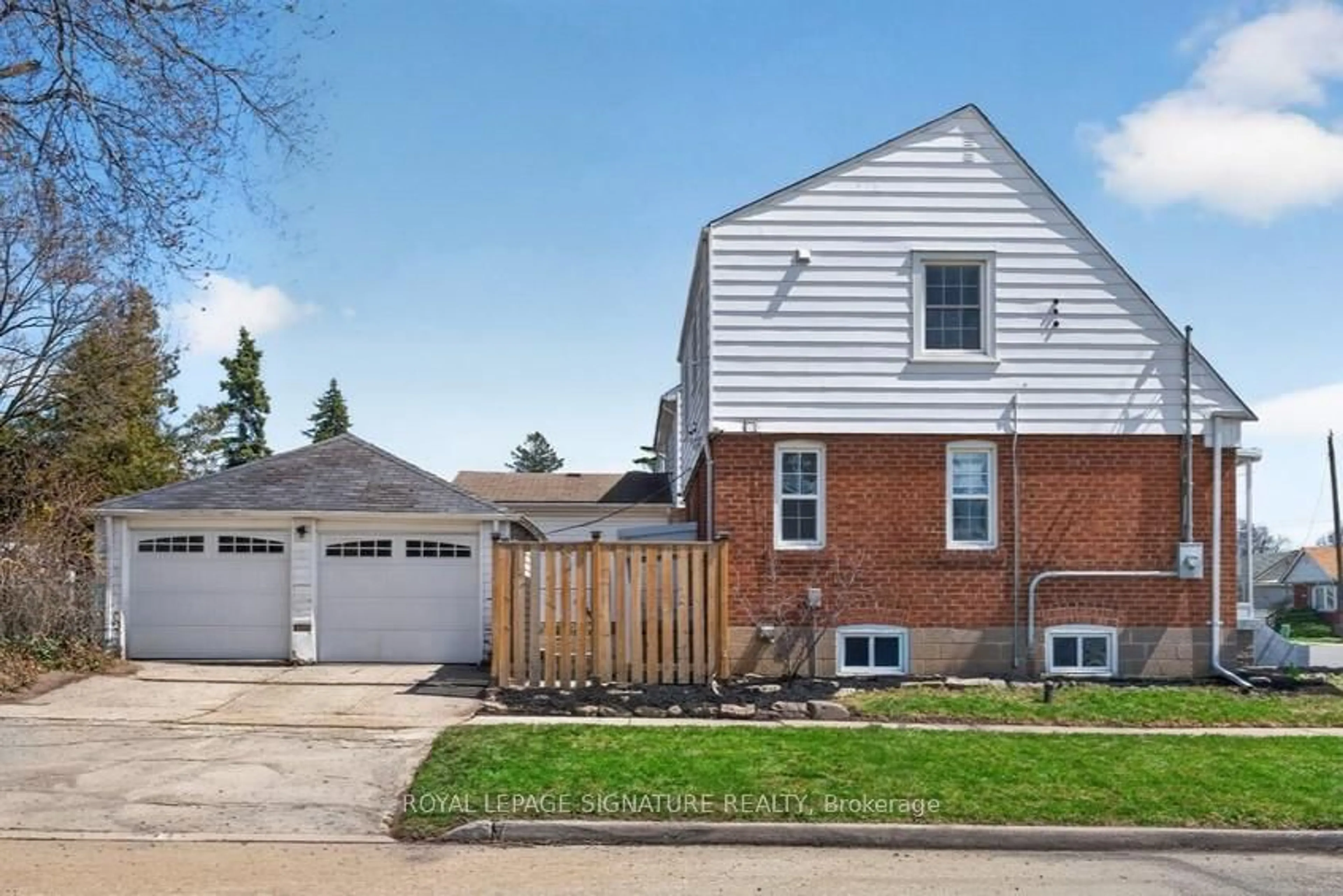 Home with brick exterior material, street for 3244 St Clair Ave, Toronto Ontario M1L 1V8