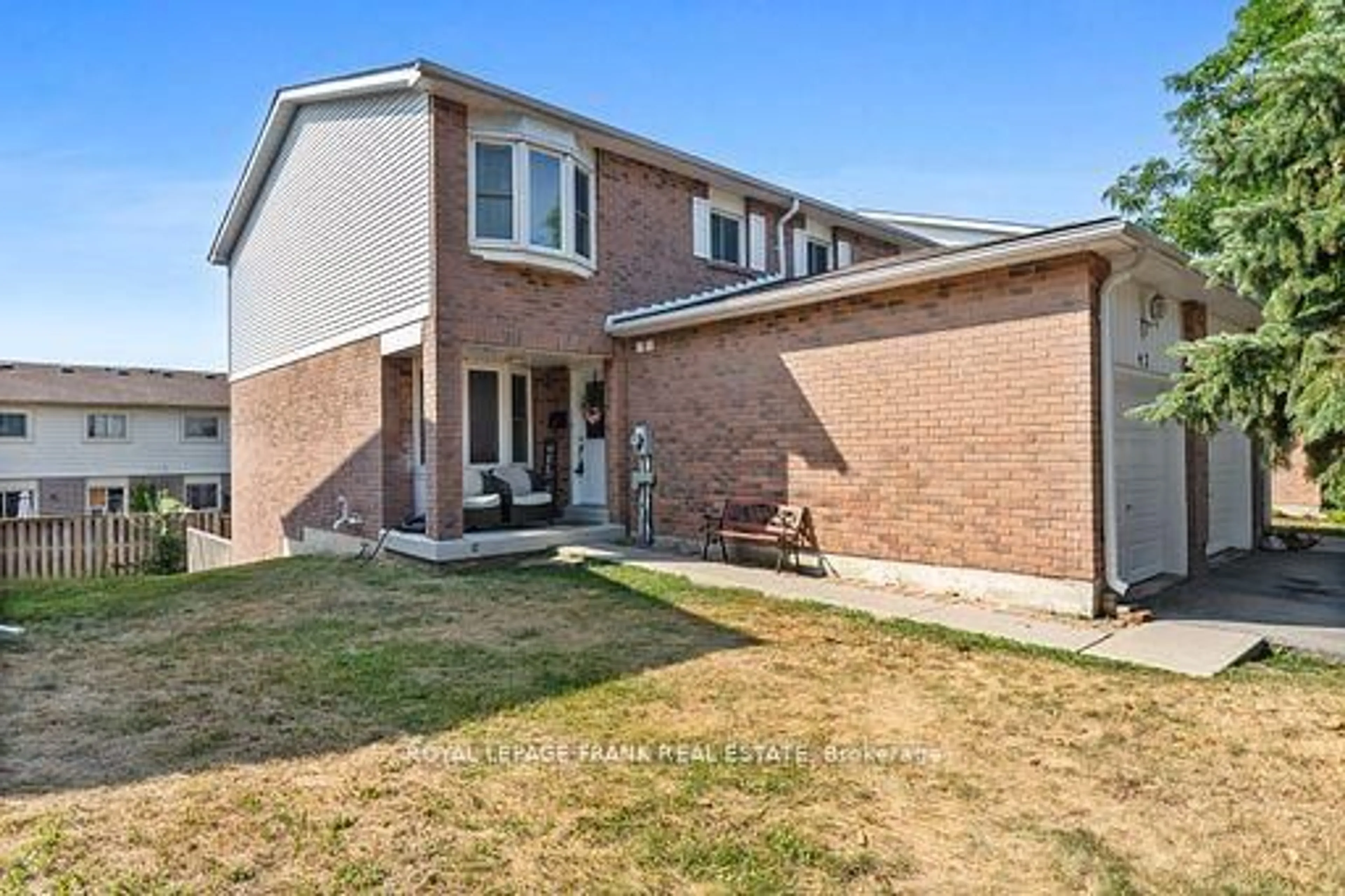 Home with brick exterior material, street for 700 Harmony Rd #42, Oshawa Ontario L1K 1S2