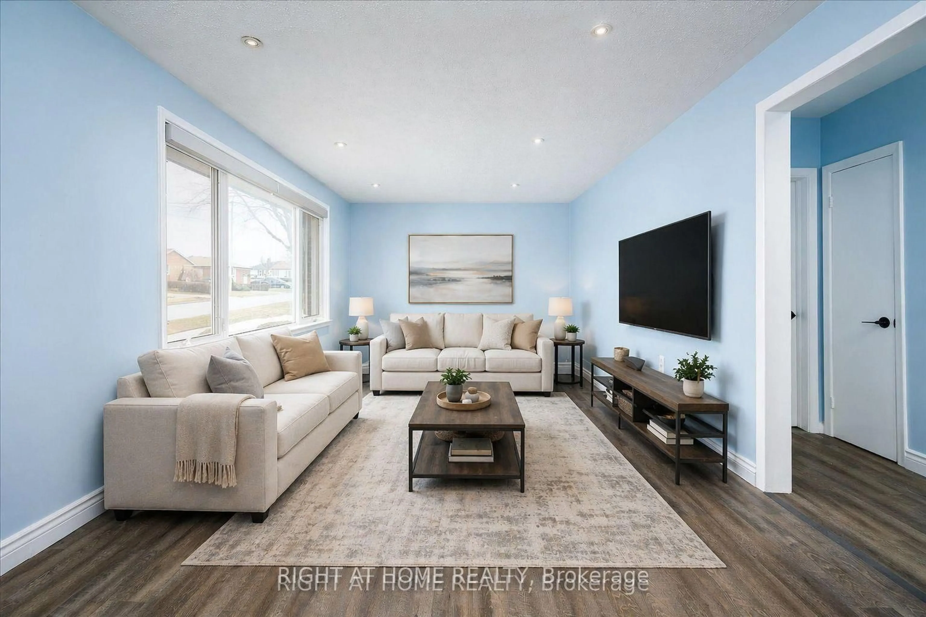 Living room with furniture, wood/laminate floor for 322 Jasper Ave, Oshawa Ontario L1J 1L5