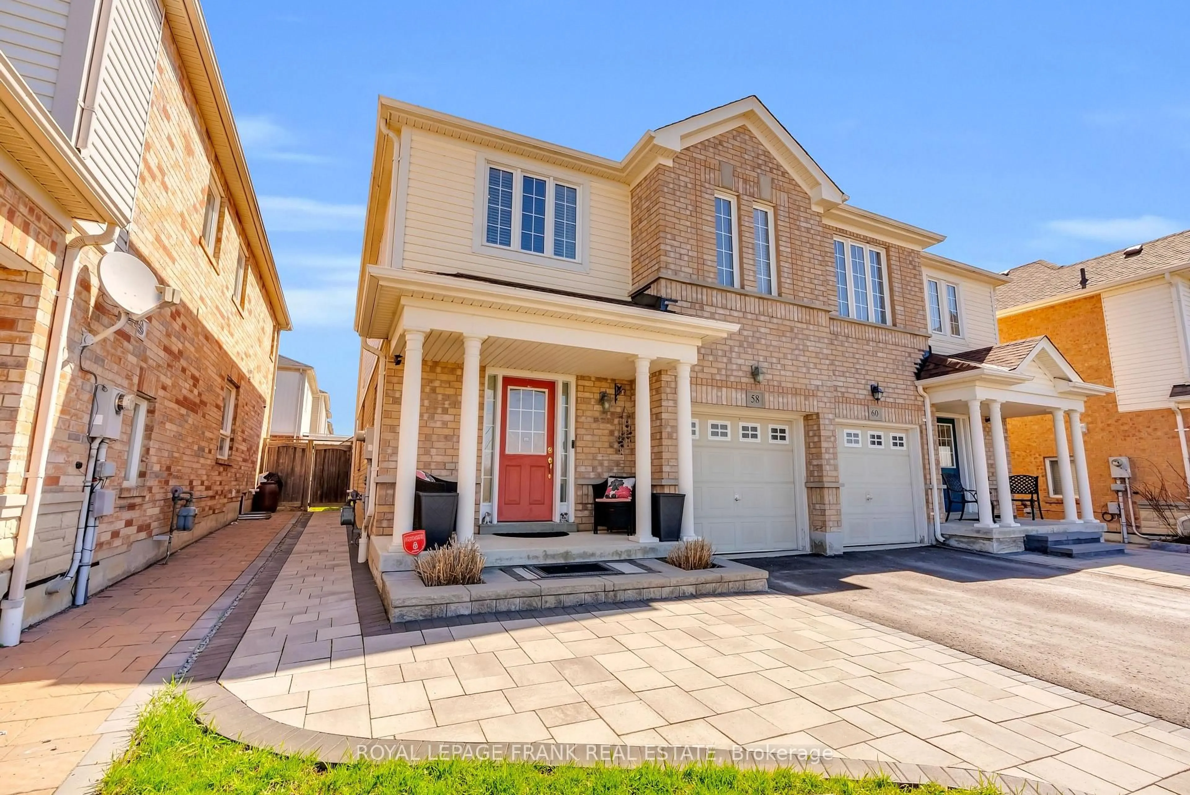 Home with brick exterior material, street for 58 Decourcy-Ireland Circ, Ajax Ontario L1T 0K6