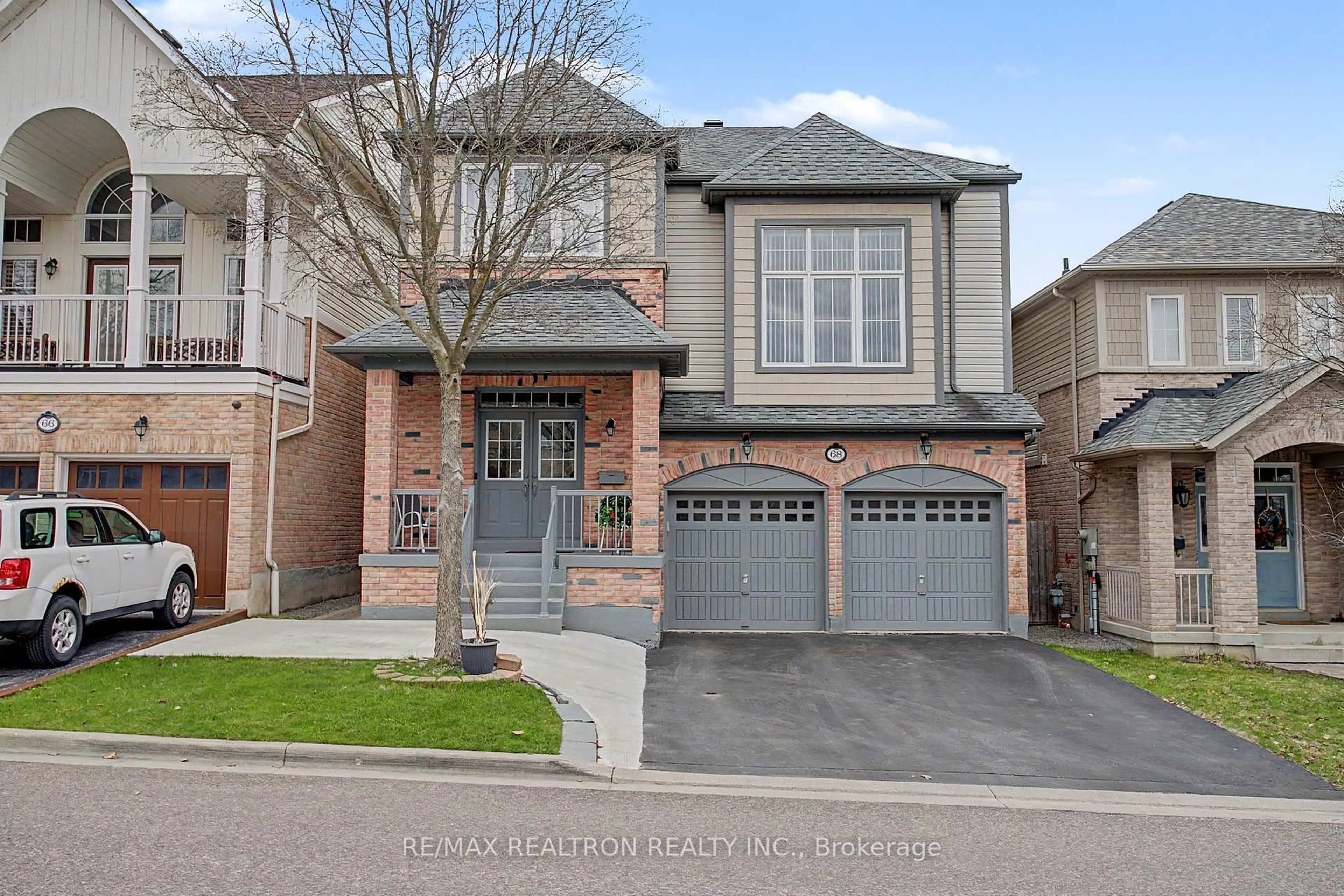 Home with brick exterior material, street for 68 Loughlin Hill Cres, Ajax Ontario L1Z 1P9