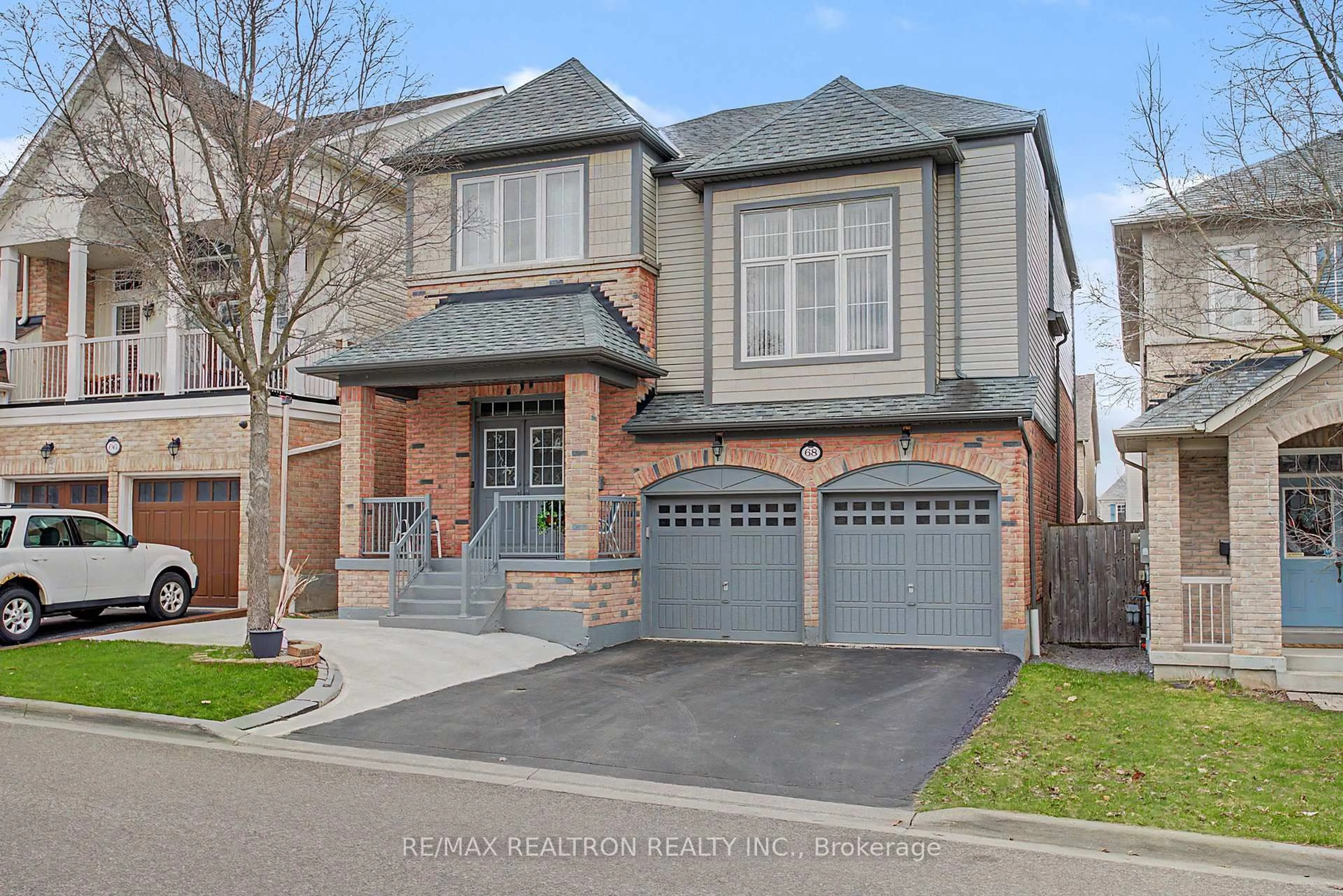 Home with brick exterior material, street for 68 Loughlin Hill Cres, Ajax Ontario L1Z 1P9