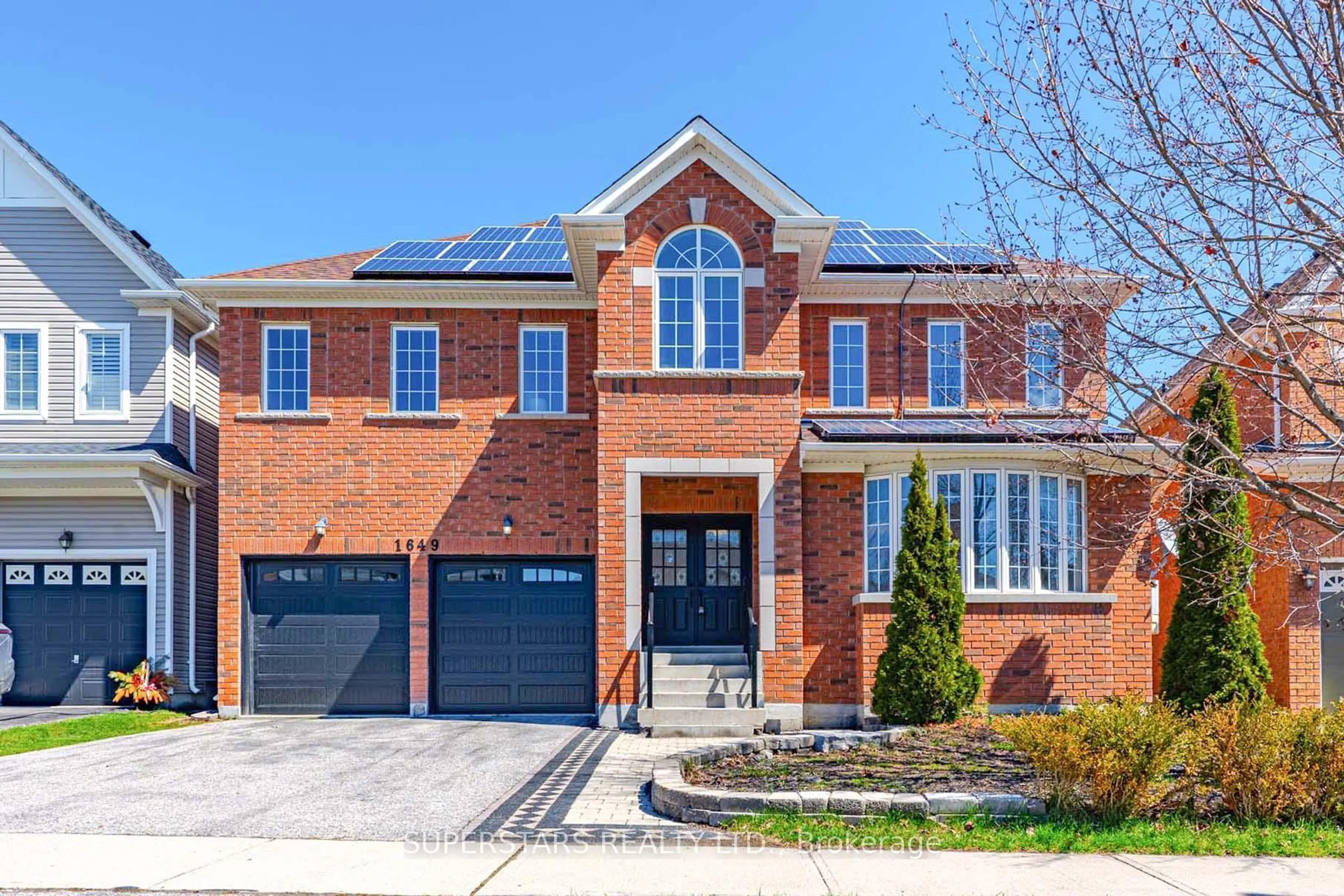 Home with brick exterior material, street for 1649 Ballantrae Dr, Oshawa Ontario L1K 0A8