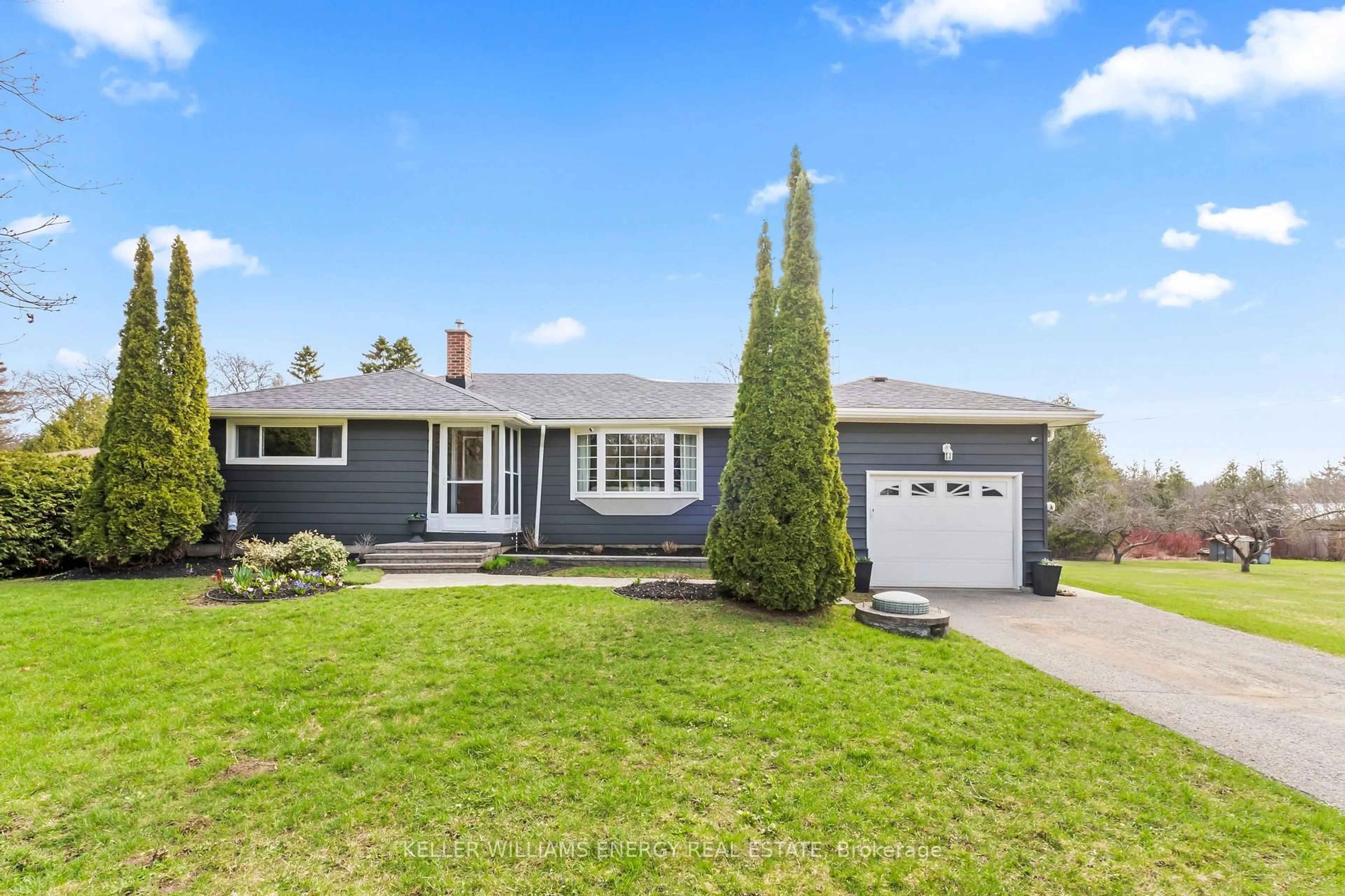 Home with vinyl exterior material, street for 2385 Maple Grove Rd, Clarington Ontario L1C 6N1