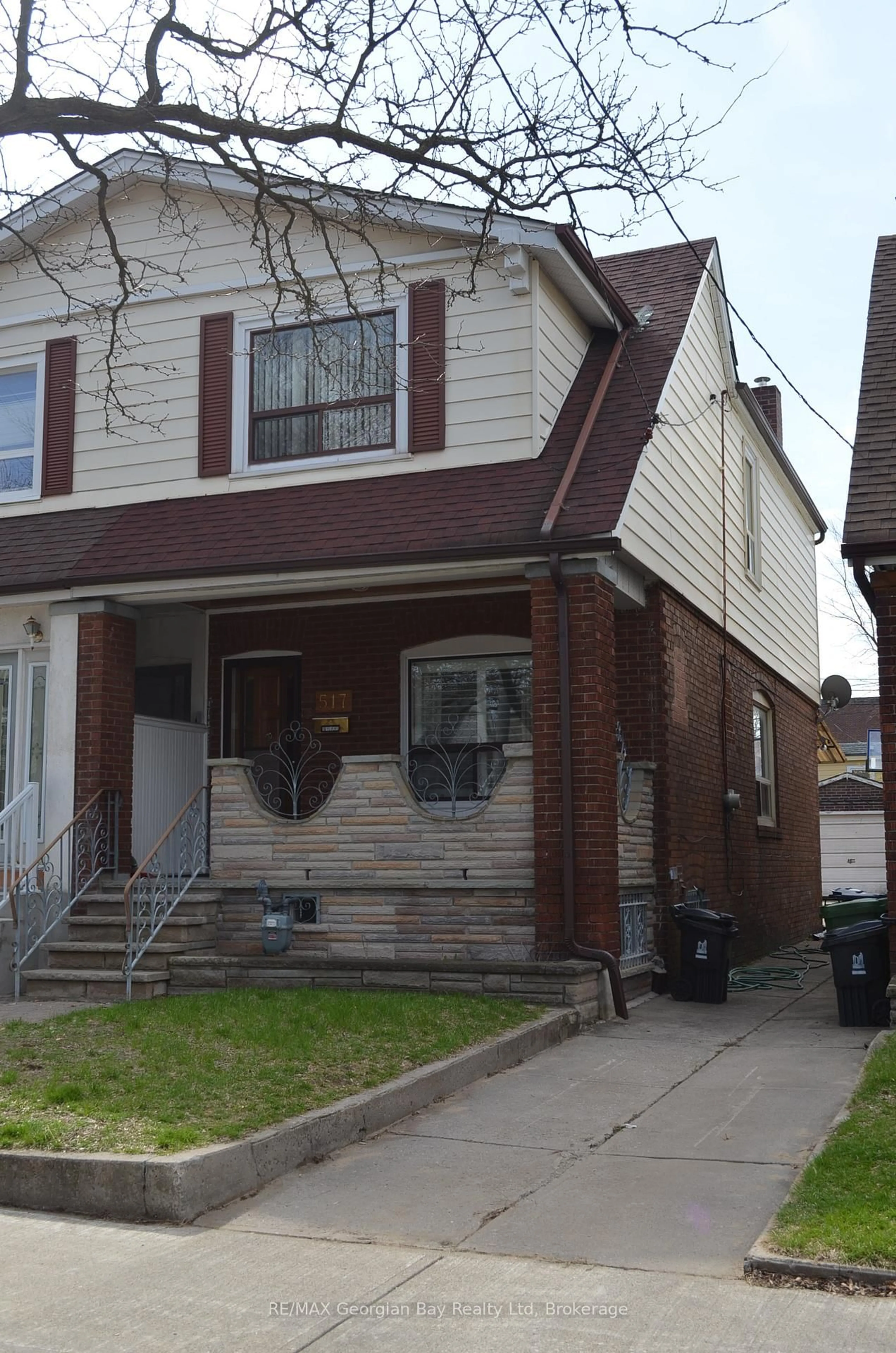 Home with brick exterior material, street for 517 Milverton Blvd, Toronto Ontario M4C 1X6