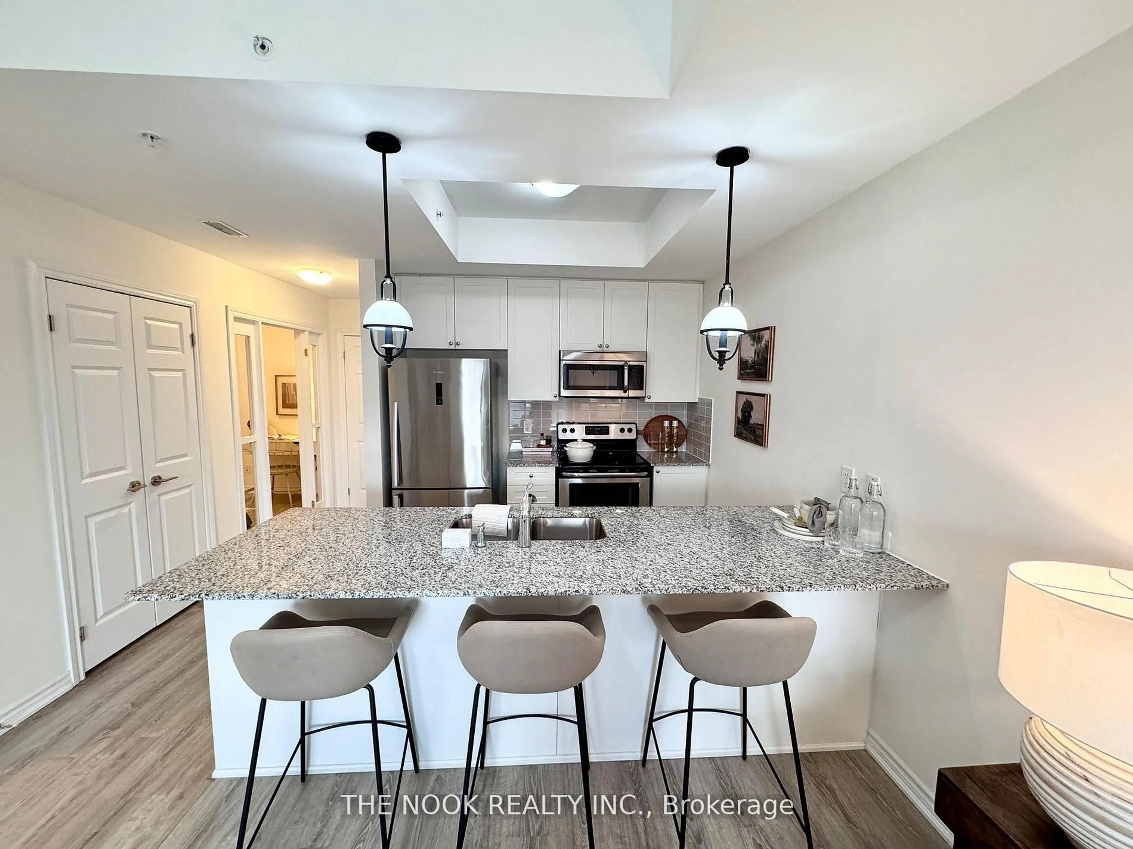 Open concept kitchen, ceramic/tile floor for 670 Gordon St #213, Whitby Ontario L1N 0K9