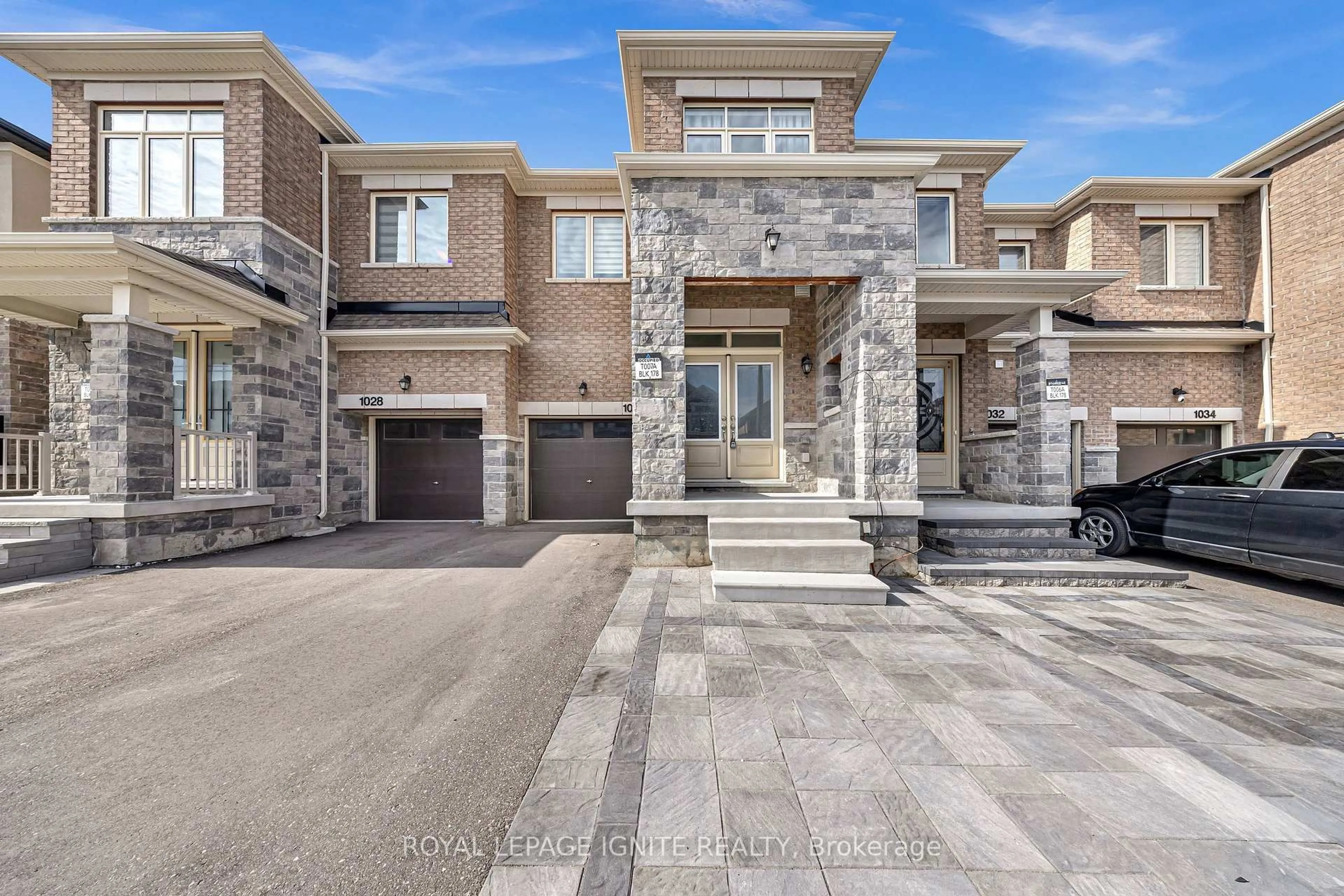 Home with brick exterior material, street for 1030 Skybridge Blvd, Pickering Ontario L1X 0G5