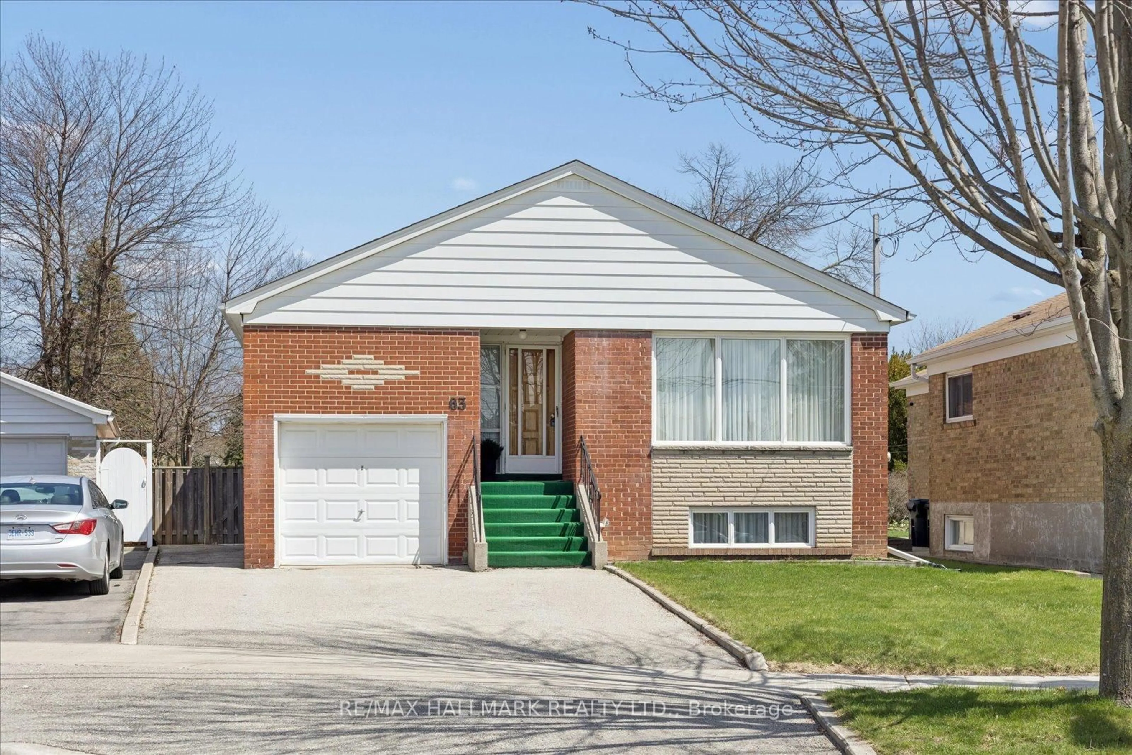 Home with brick exterior material, street for 63 Montvale Dr, Toronto Ontario M1M 3E5