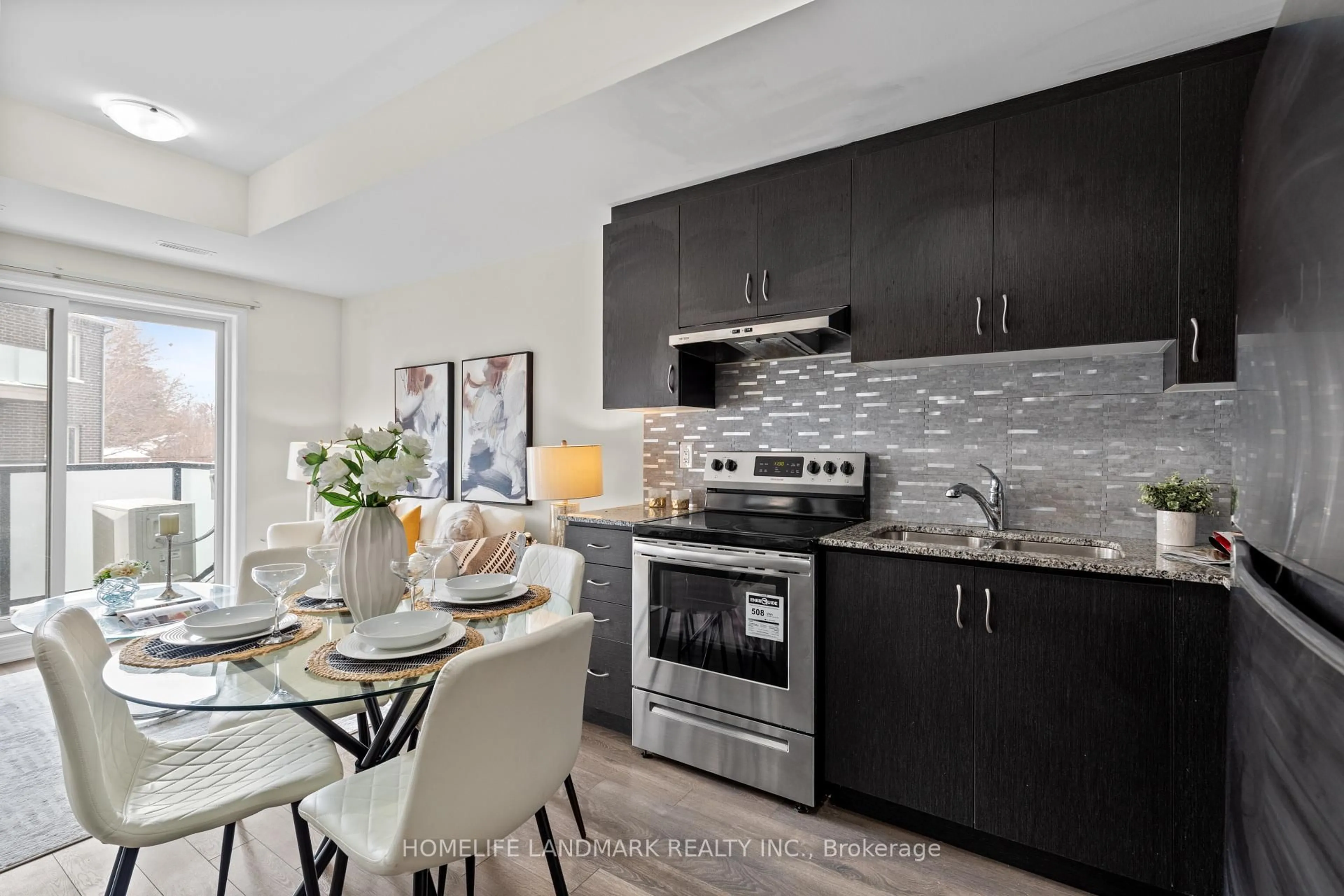 Open concept kitchen, ceramic/tile floor for 1085 Danforth Rd #214, Toronto Ontario L3R 1A4