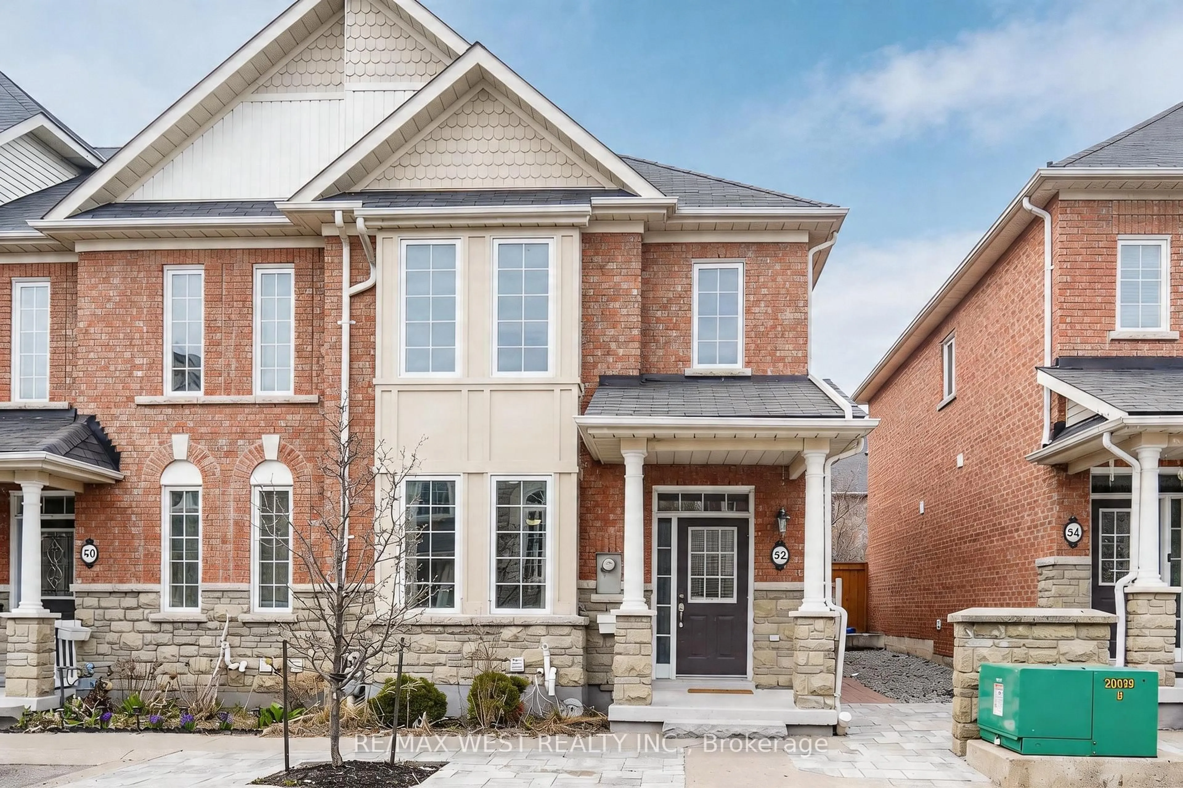 Home with brick exterior material, street for 52 Torr Lane, Ajax Ontario L1S 7M9