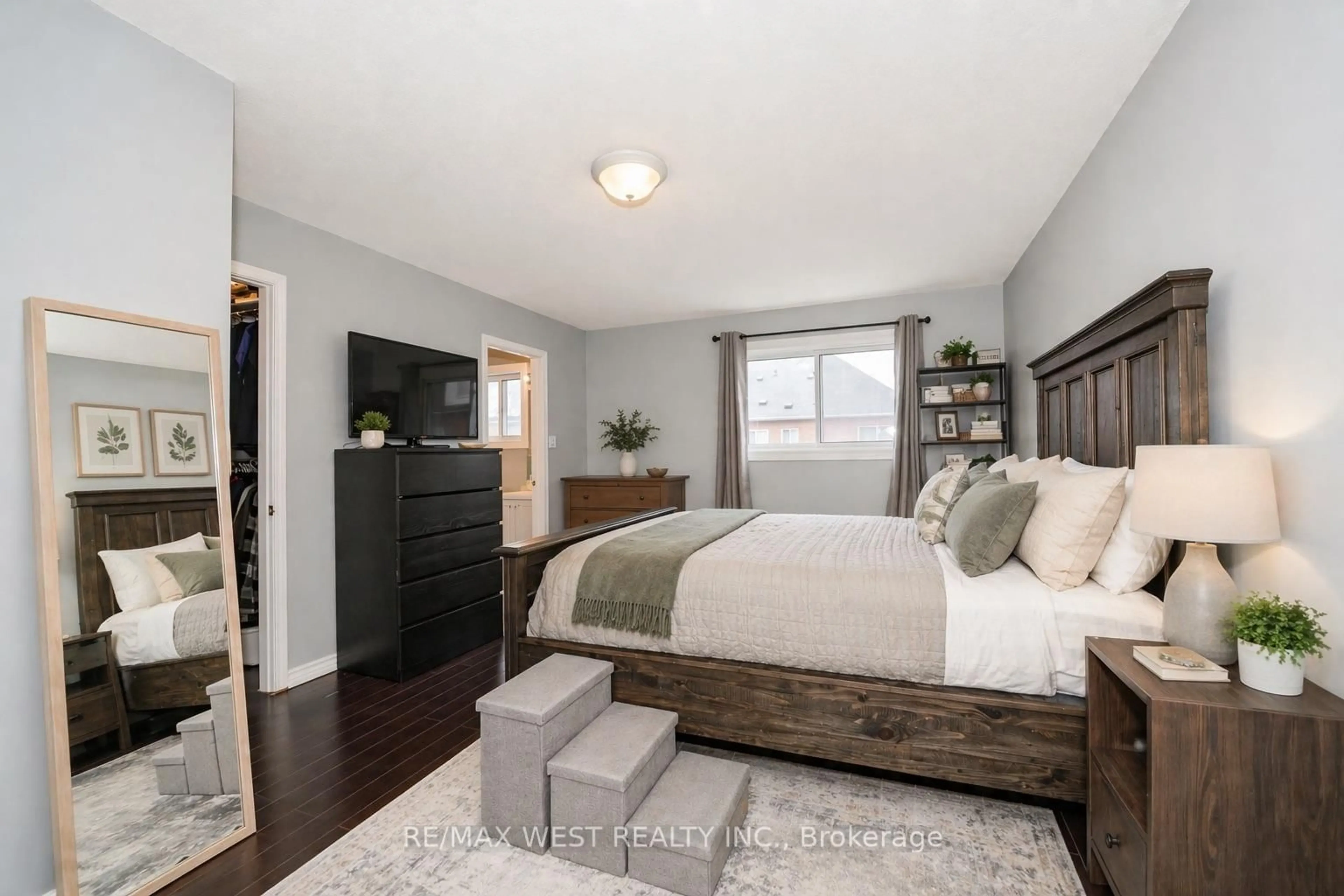 Bedroom with bed, wood/laminate floor for 52 Torr Lane, Ajax Ontario L1S 7M9