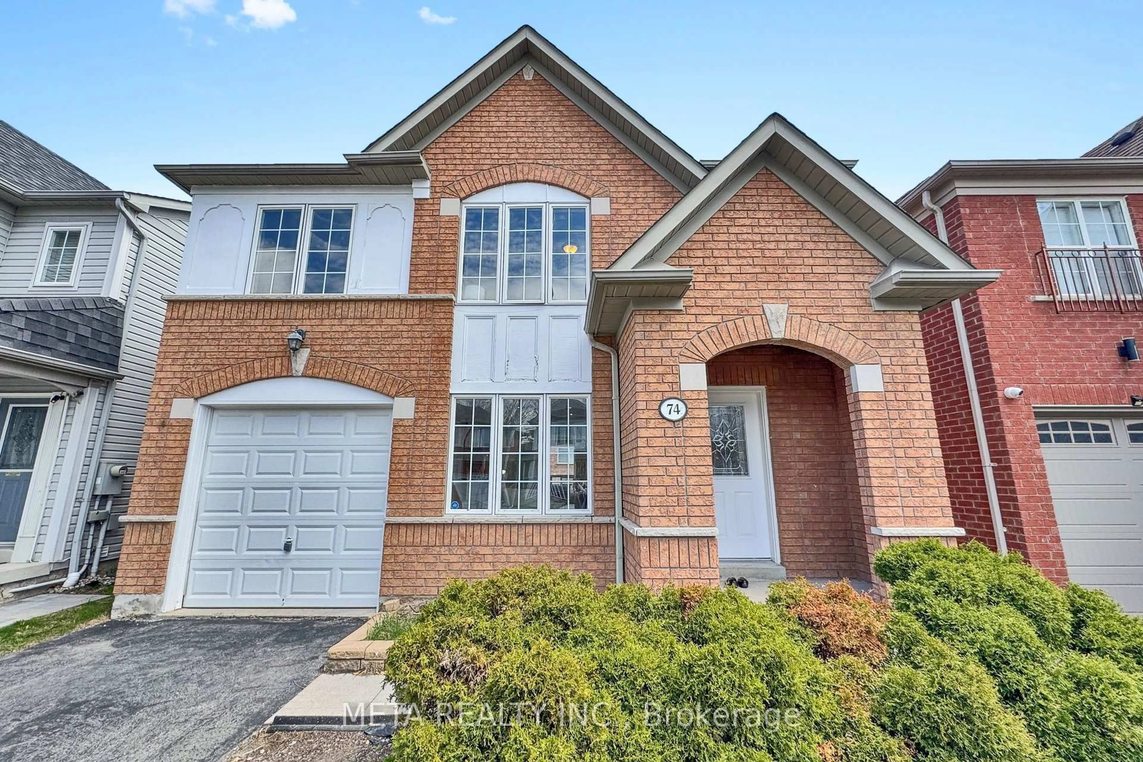 Home with brick exterior material, street for 74 McSweeney Cres, Ajax Ontario L1T 4G2