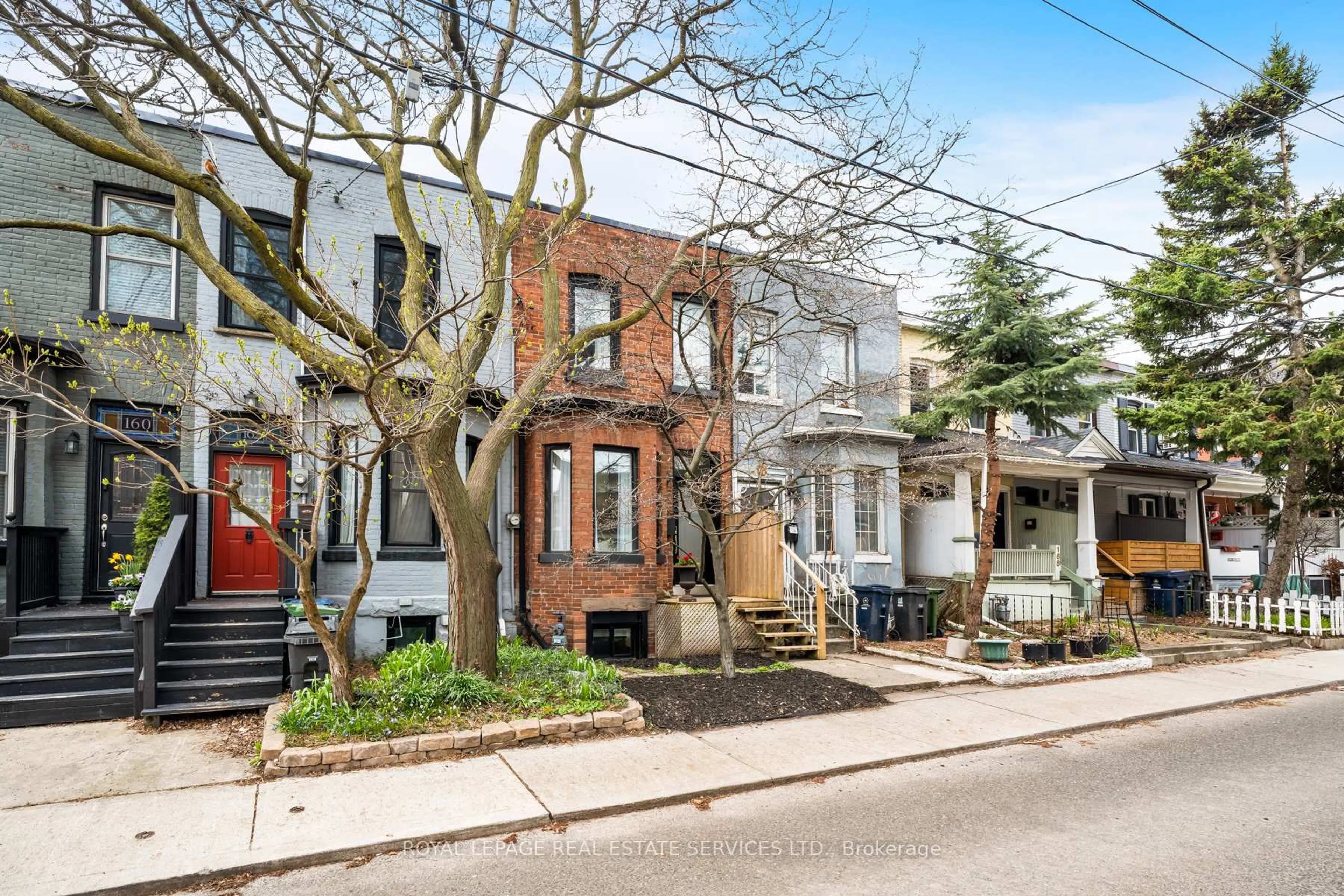 Home with brick exterior material, street for 164 Munro St, Toronto Ontario M4M 2B9