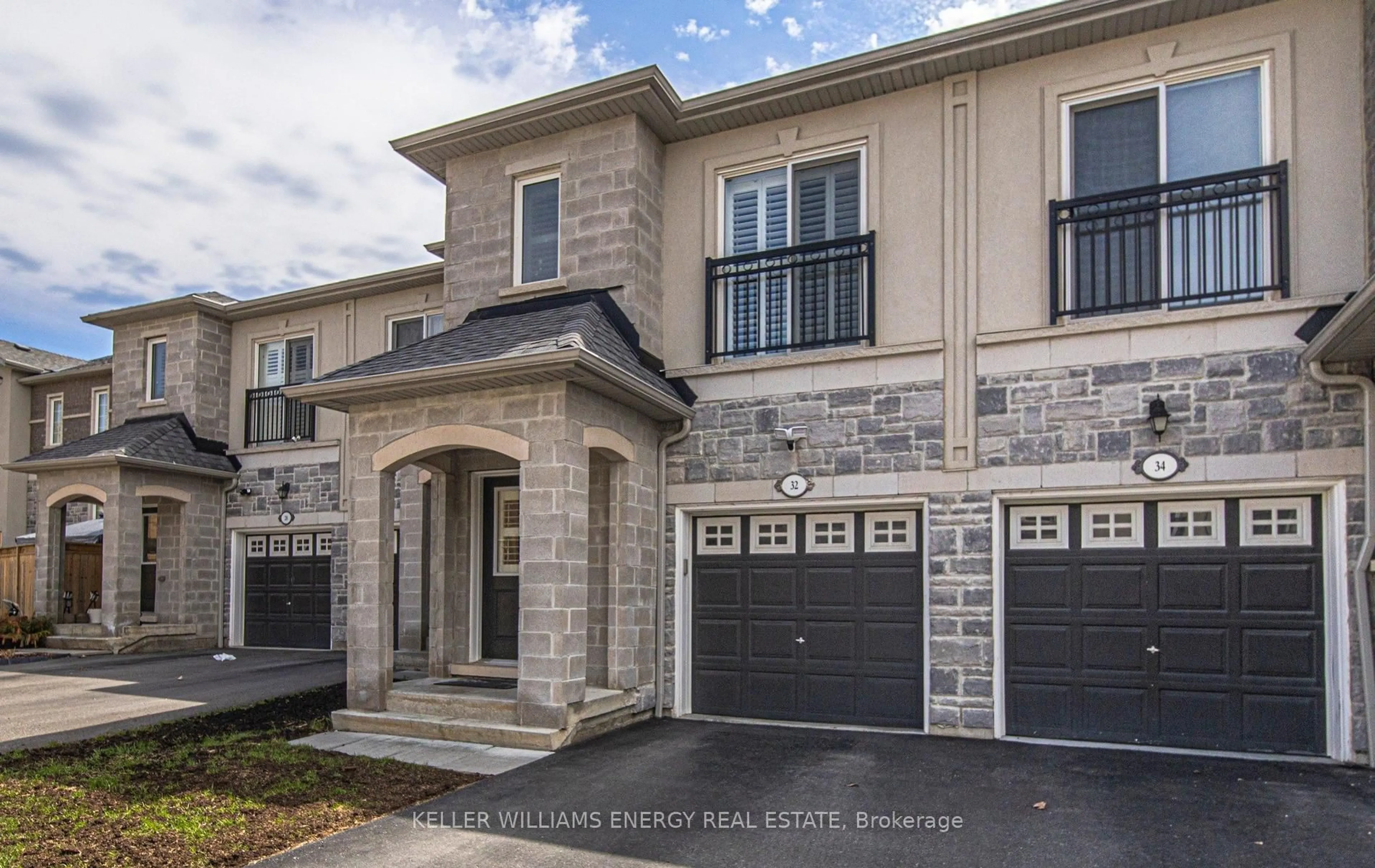 Home with brick exterior material, street for 32 Kantium Way, Whitby Ontario L1N 0L4