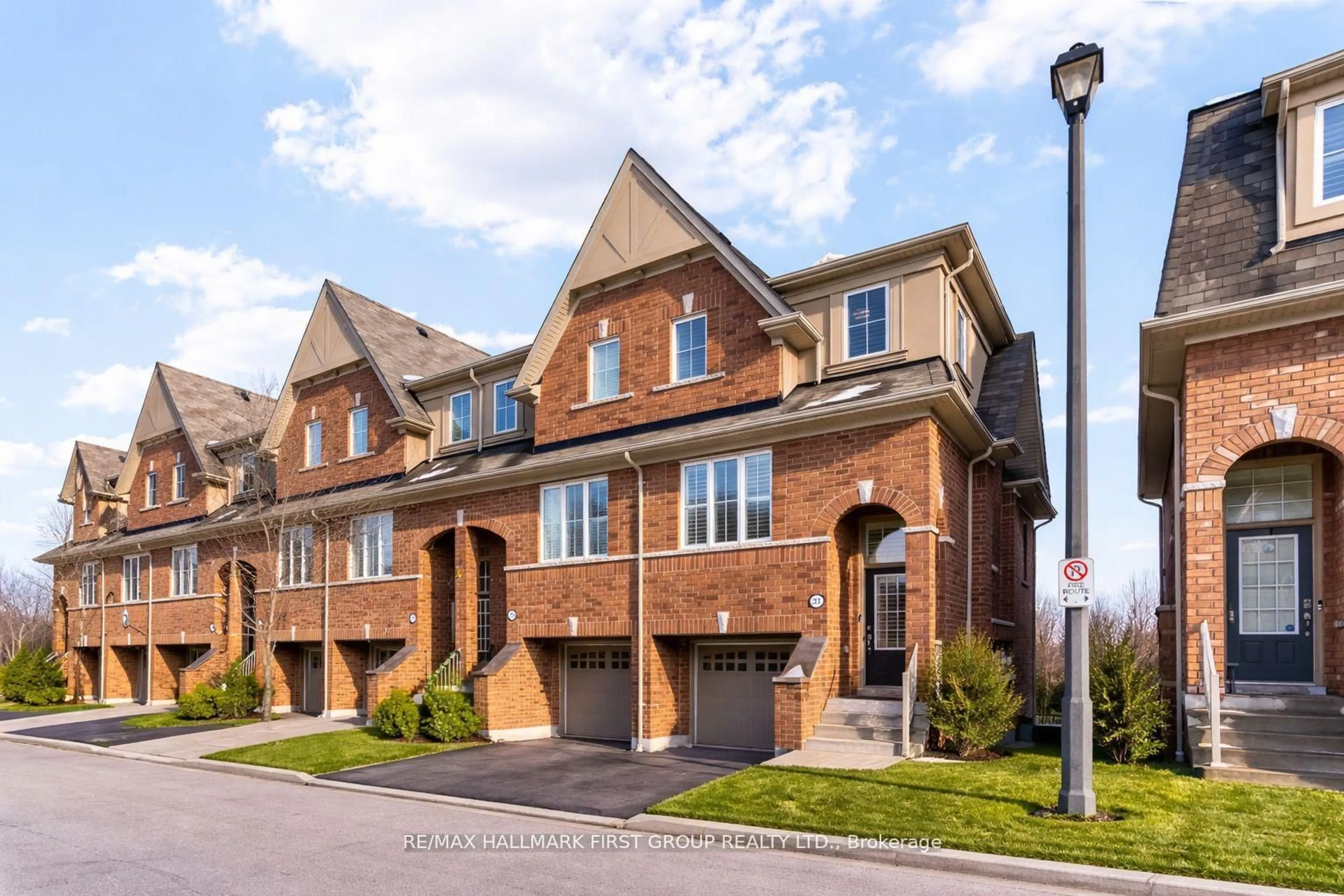 Home with brick exterior material, street for 31 Reevesmere Lane, Ajax Ontario L1Z 0L3