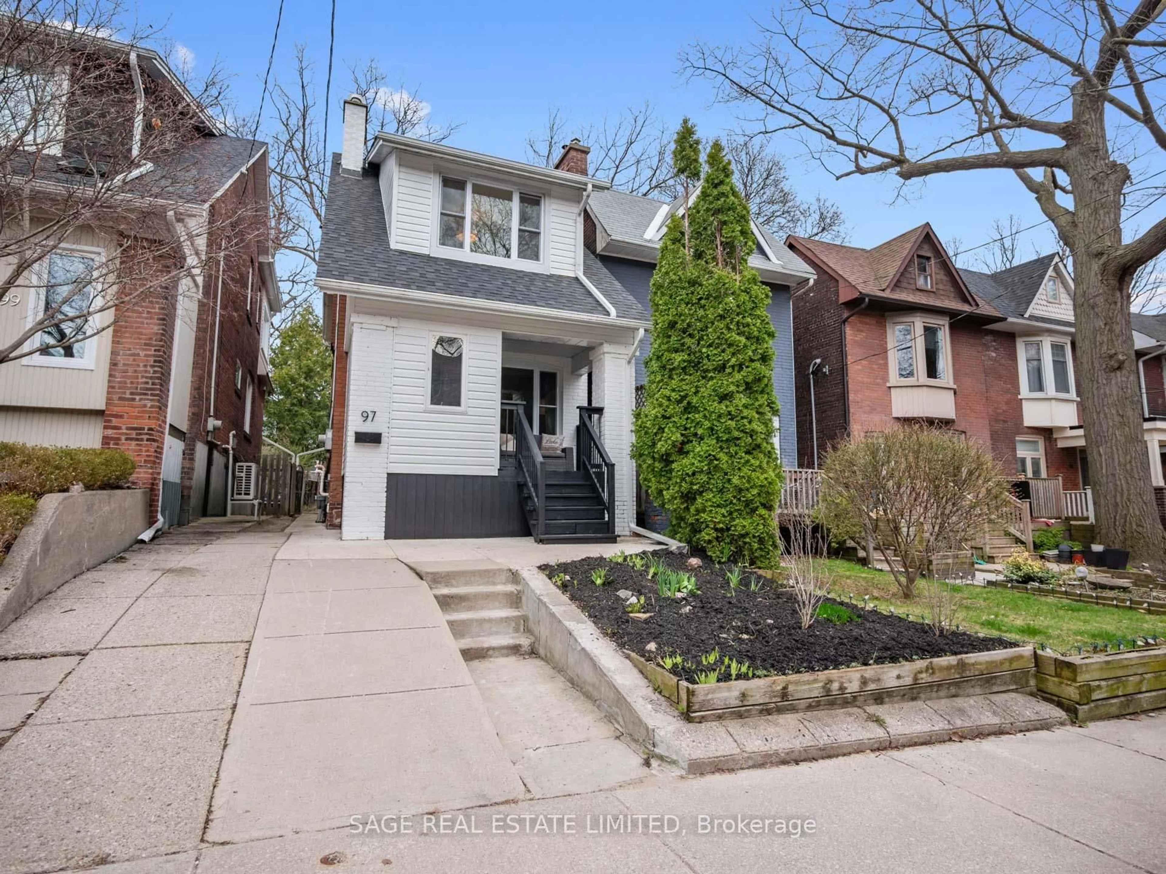 Home with brick exterior material, street for 97 Bowmore Rd, Toronto Ontario M4L 3J1