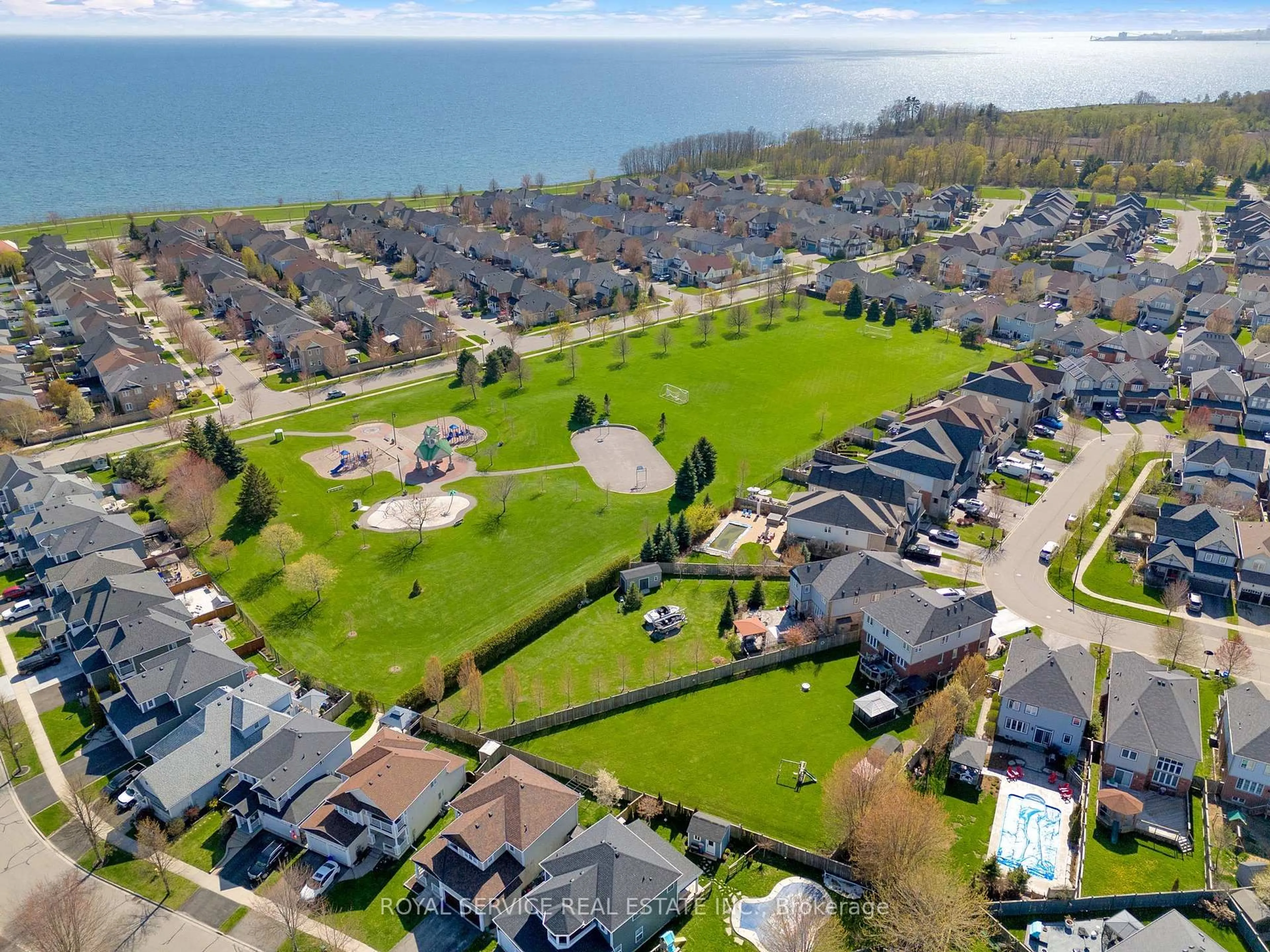 A pic from outside/outdoor area/front of a property/back of a property/a pic from drone, water/lake/river/ocean view for 35 Alldread Cres, Clarington Ontario L1B 0C2