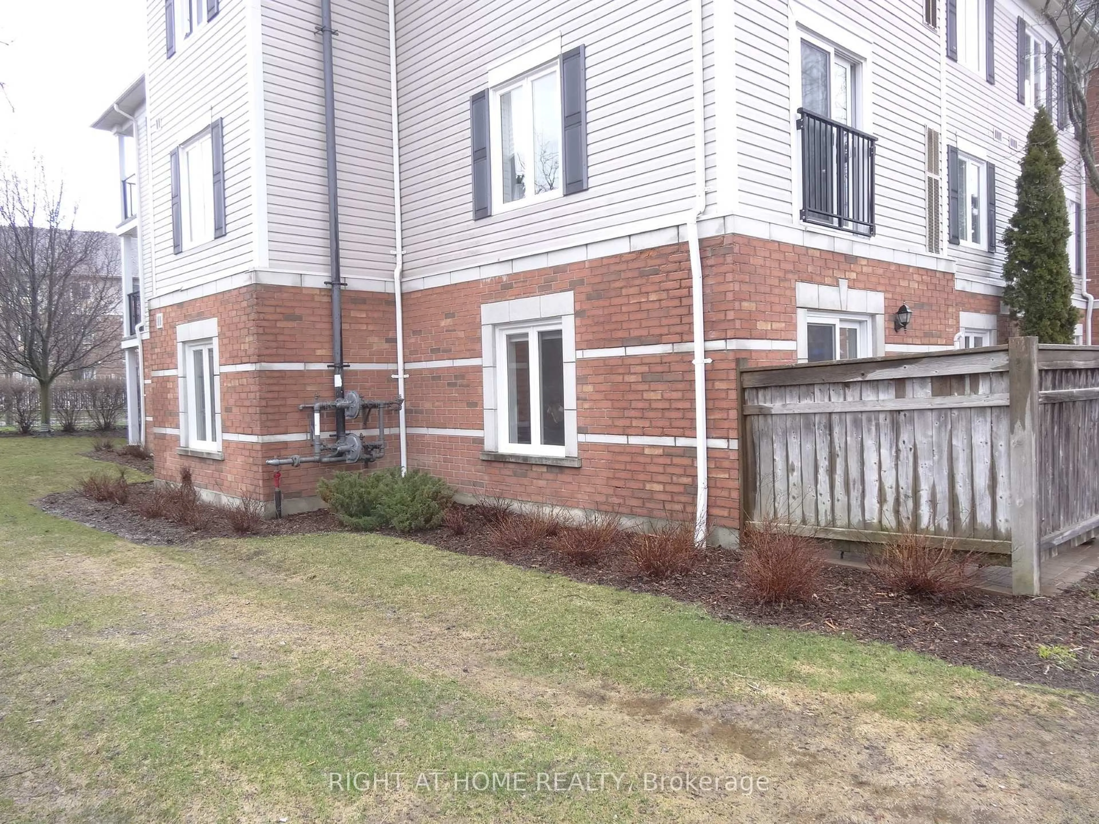 A pic from outside/outdoor area/front of a property/back of a property/a pic from drone, street for 102 Aspen Springs Dr #106, Clarington Ontario L1C 5N6