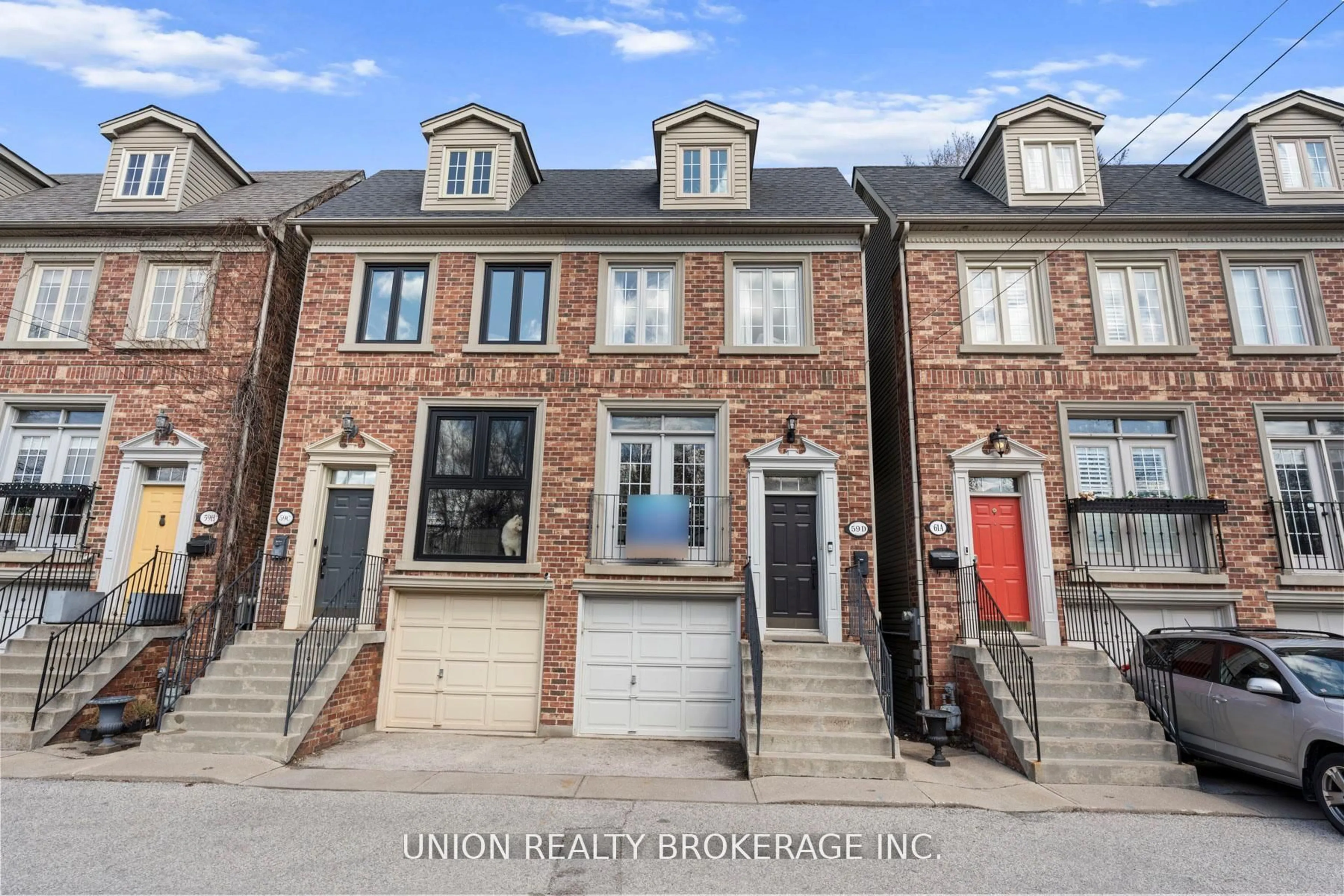 Home with brick exterior material, street for 59D Woodbine Ave, Toronto Ontario M4L 3P1