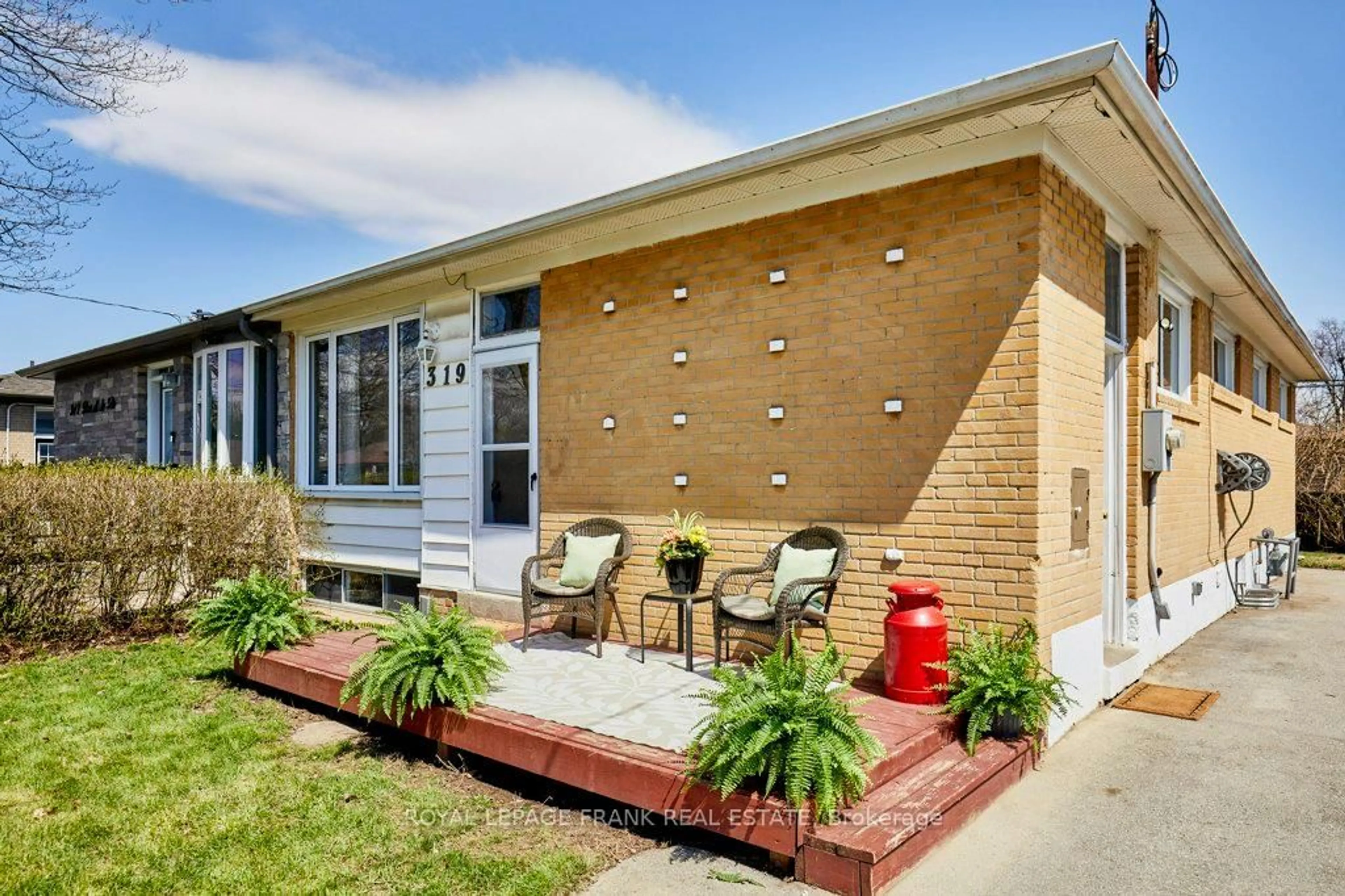 Home with brick exterior material, street for 319 Dovedale Dr, Whitby Ontario L1N 1Z8