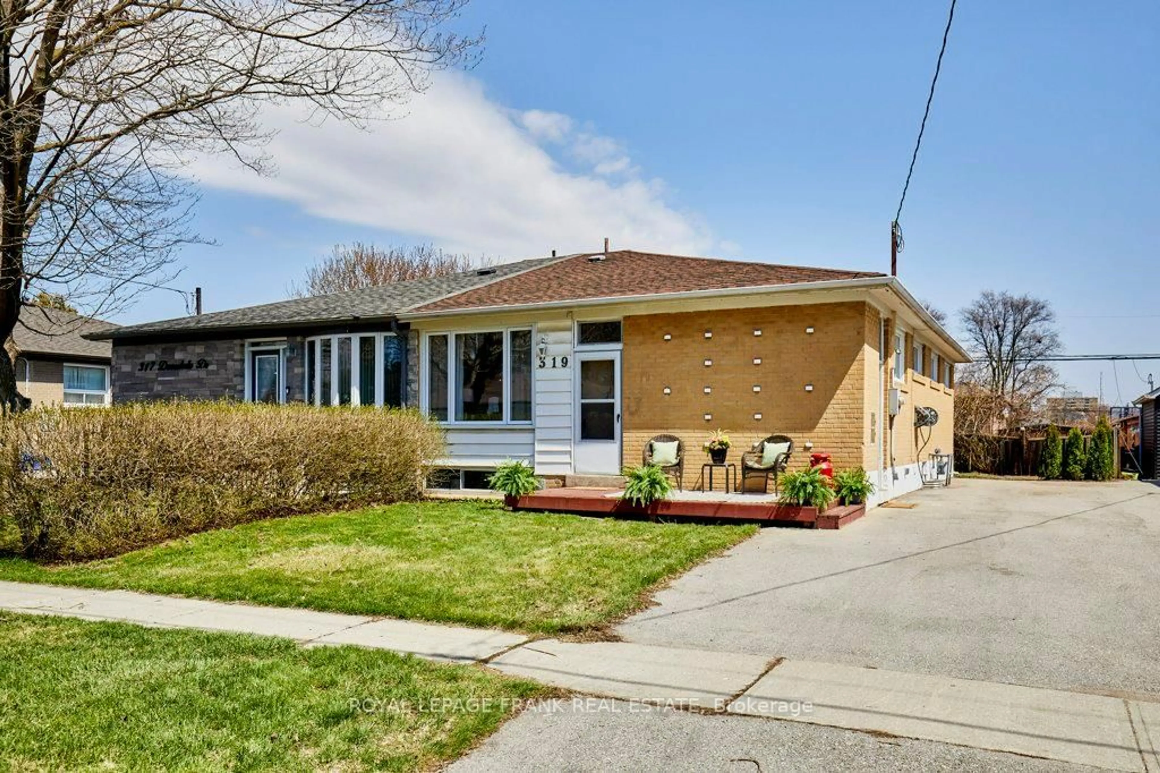 Home with brick exterior material, street for 319 Dovedale Dr, Whitby Ontario L1N 1Z8