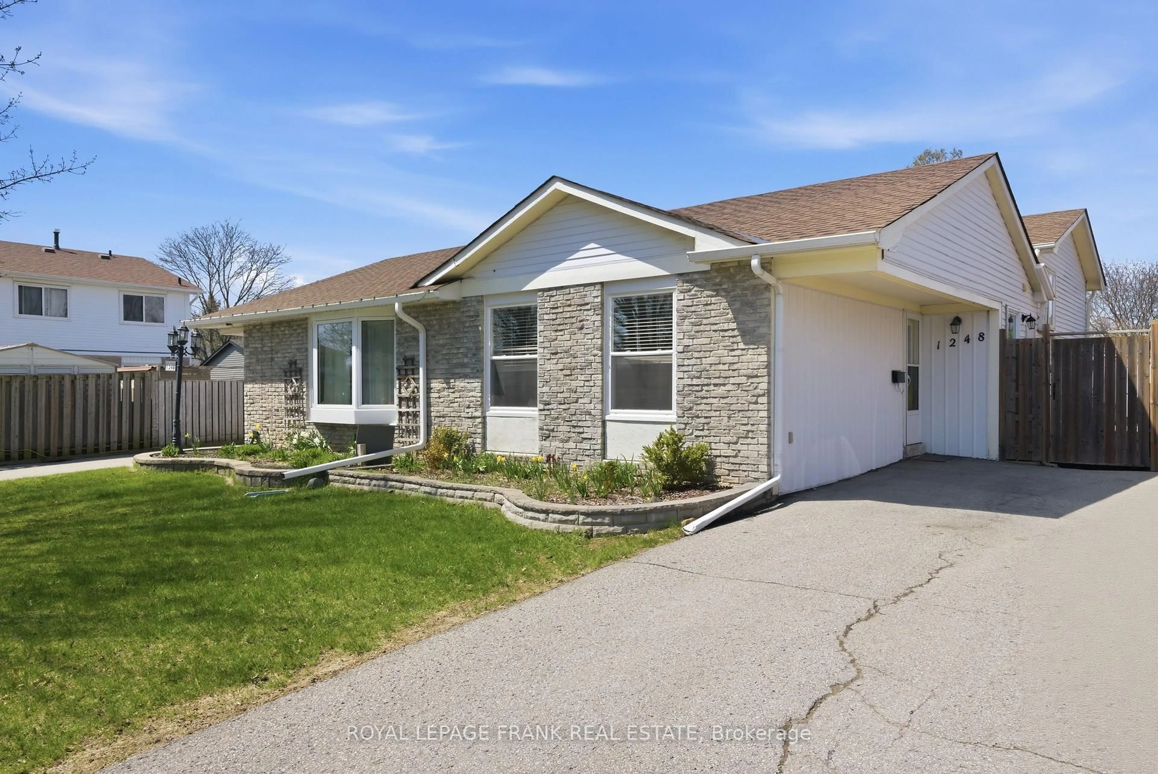 Home with vinyl exterior material, street for 1248 Astra Ave, Oshawa Ontario L1K 1H4