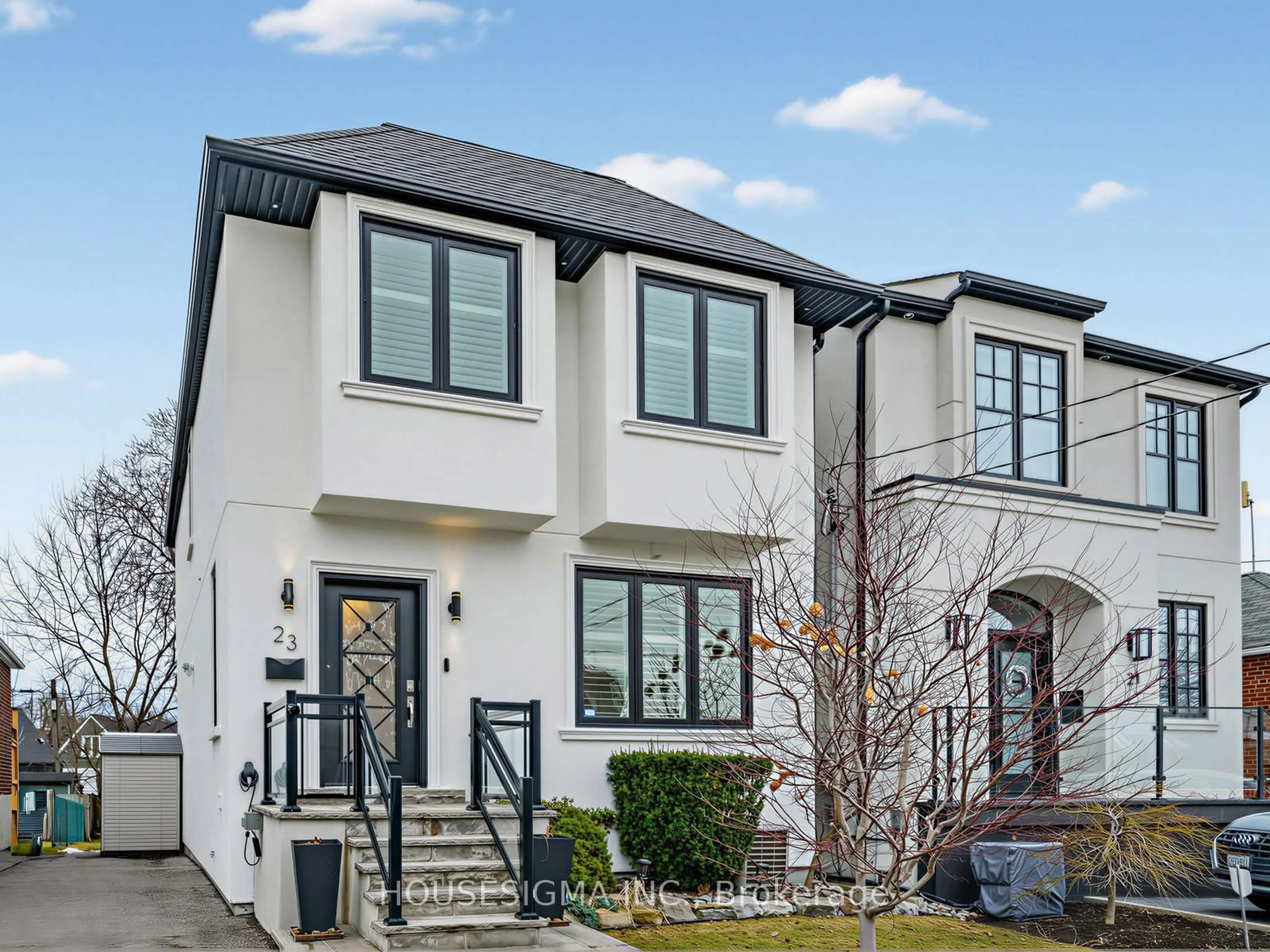 Home with brick exterior material, street for 23 Tiago Ave, Toronto Ontario M4B 1Z9