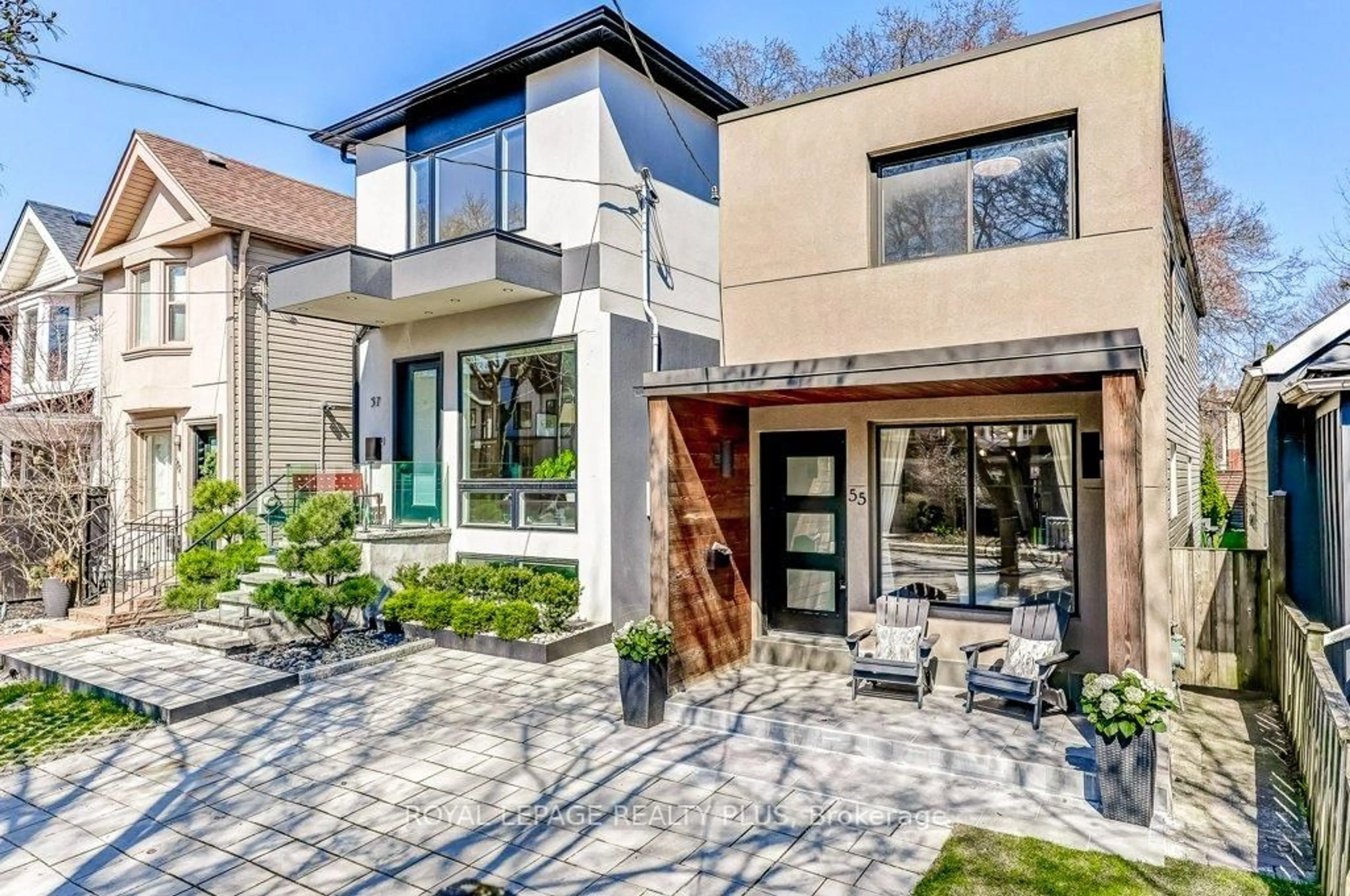 Home with brick exterior material, street for 55 Rhodes Ave, Toronto Ontario M4L 2Z8