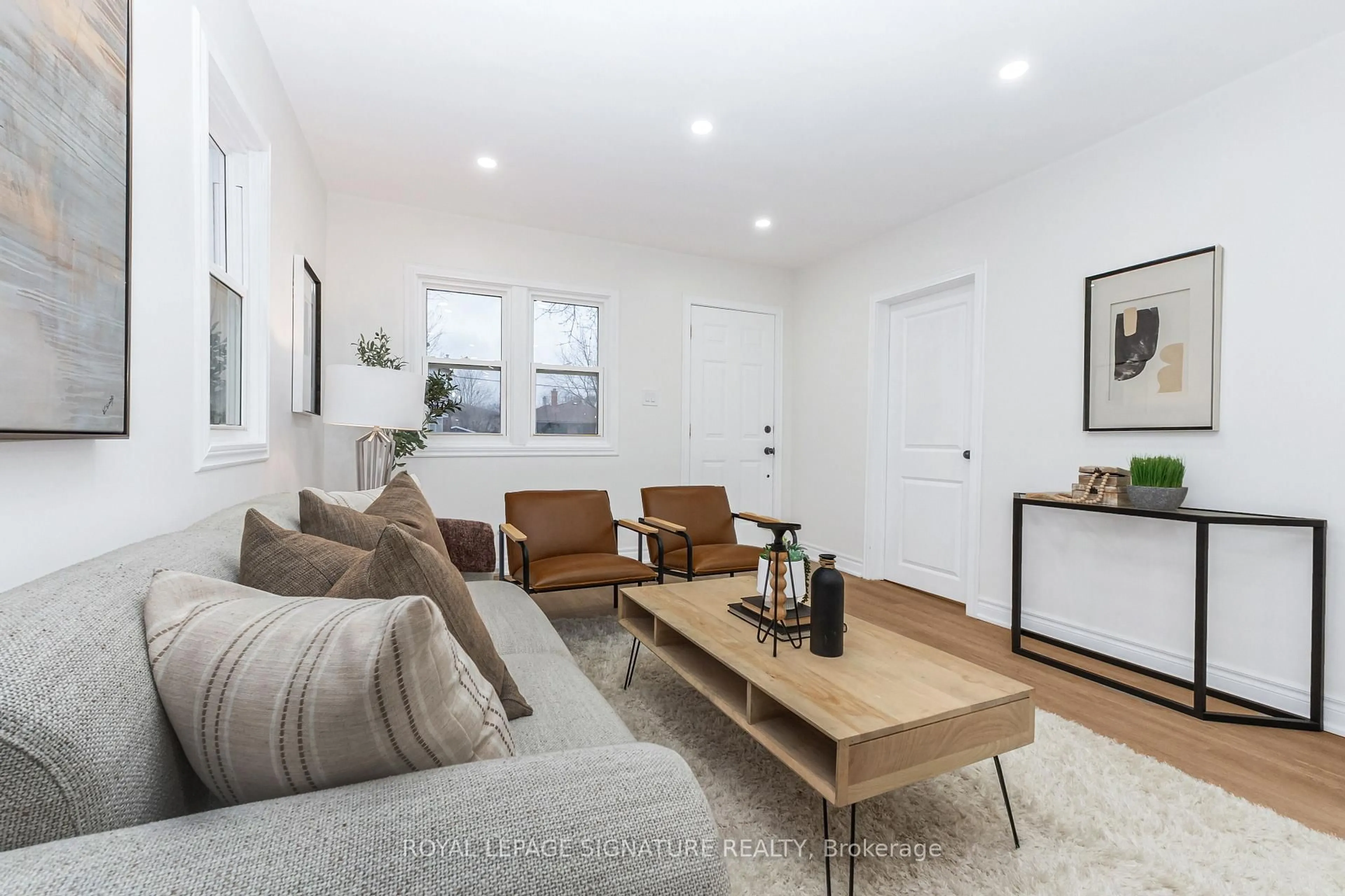 Living room with furniture, wood/laminate floor for 377 Adelaide Ave, Oshawa Ontario L1J 2R7