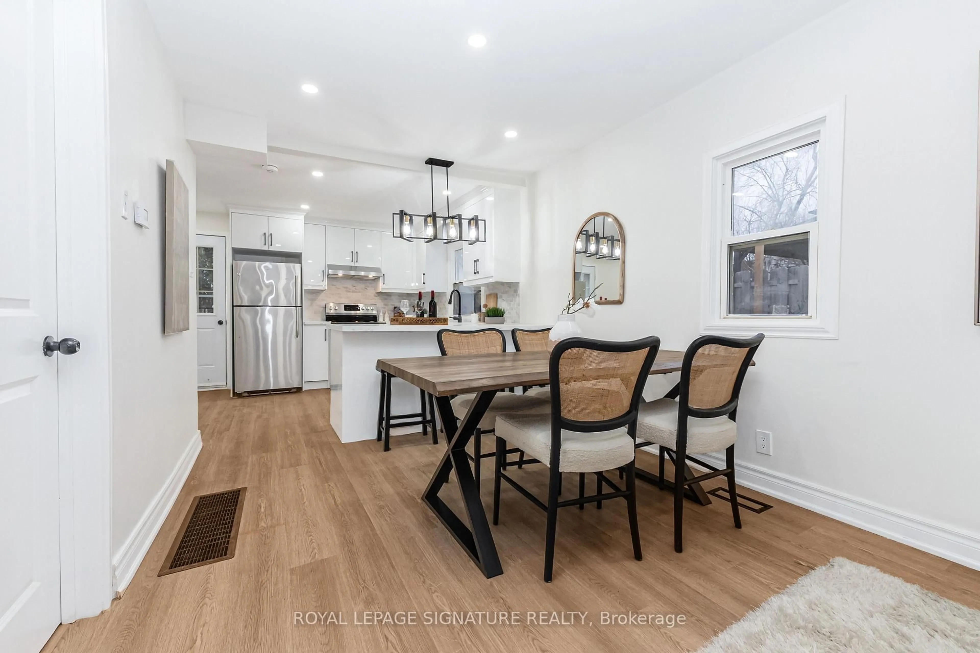 Open concept kitchen, wood/laminate floor for 377 Adelaide Ave, Oshawa Ontario L1J 2R7