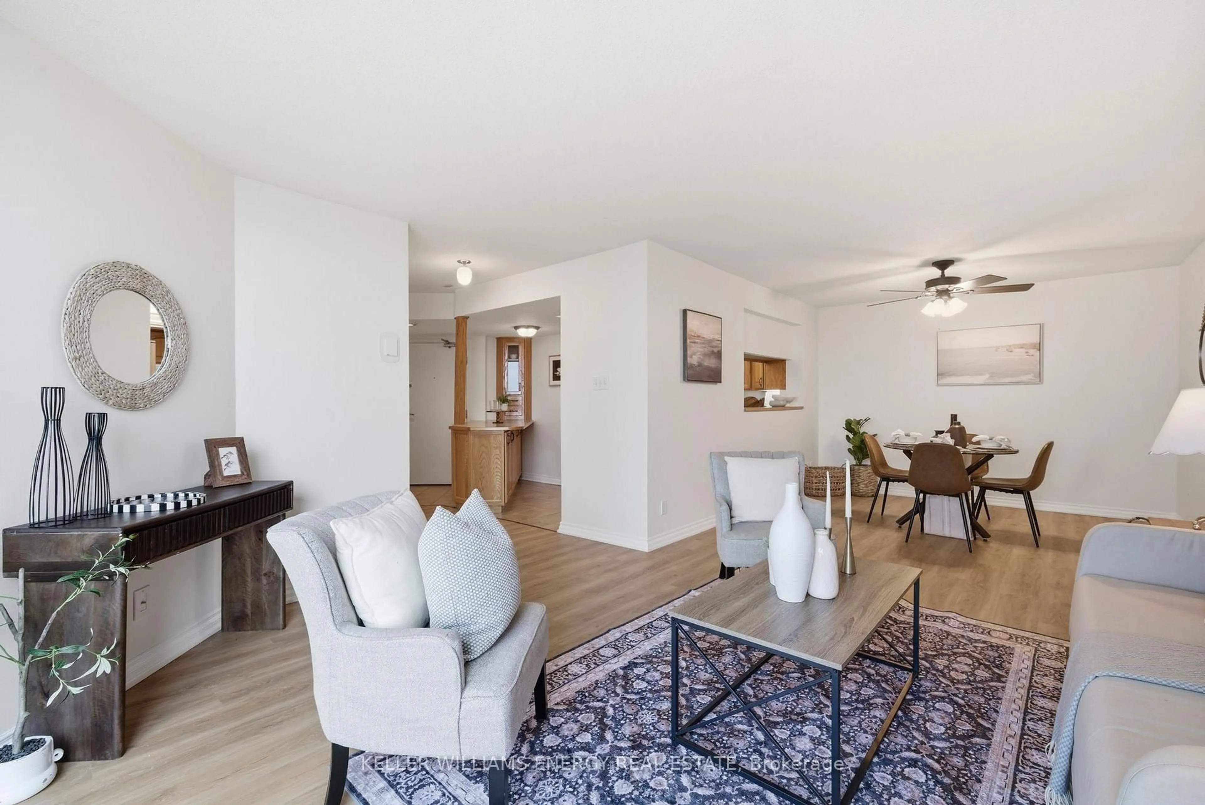 Living room with furniture, wood/laminate floor for 360 Watson St #610, Whitby Ontario L1N 9G2