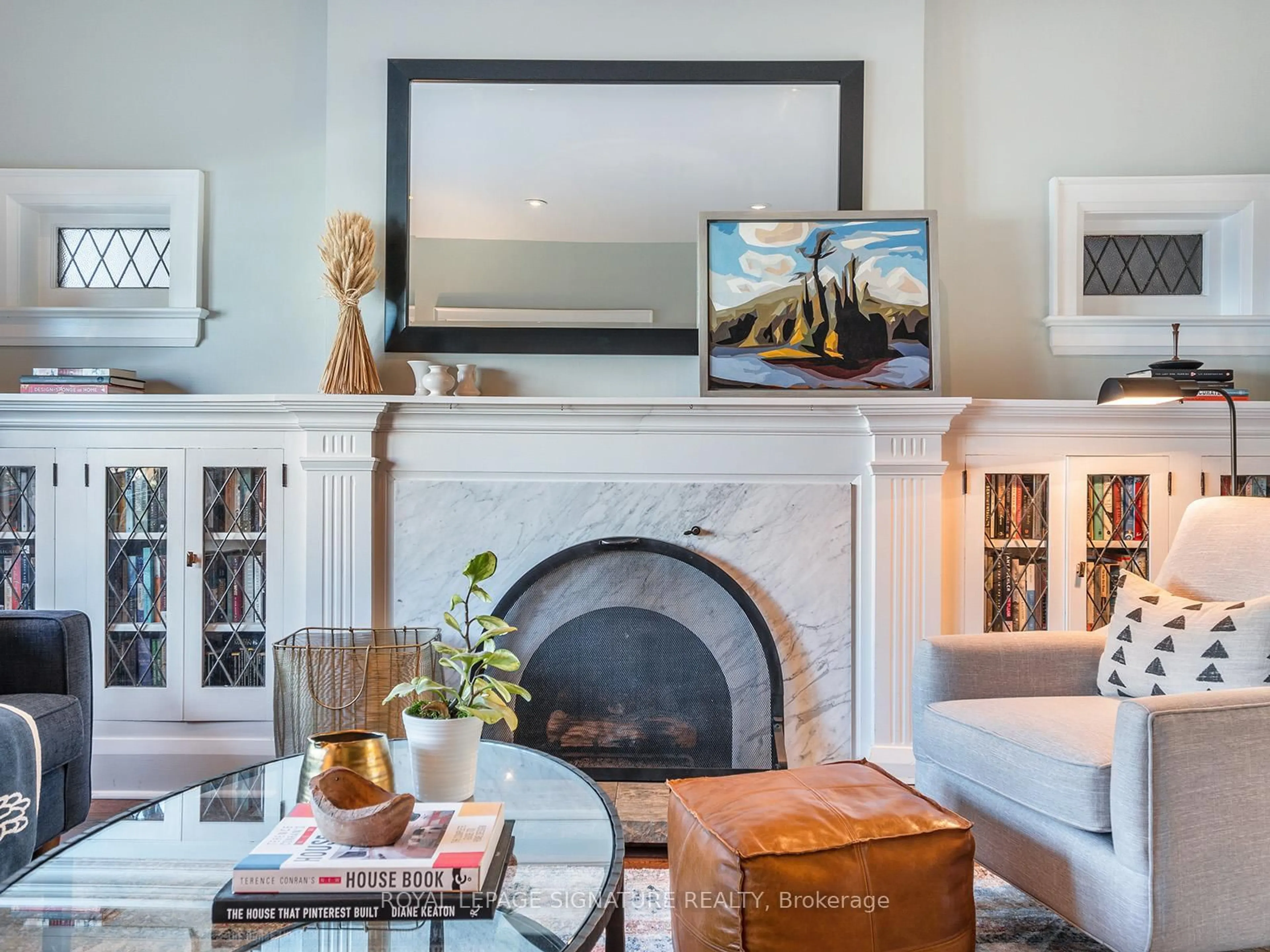 Living room with furniture, wood/laminate floor for 390 Kingswood Rd, Toronto Ontario M4E 3P1