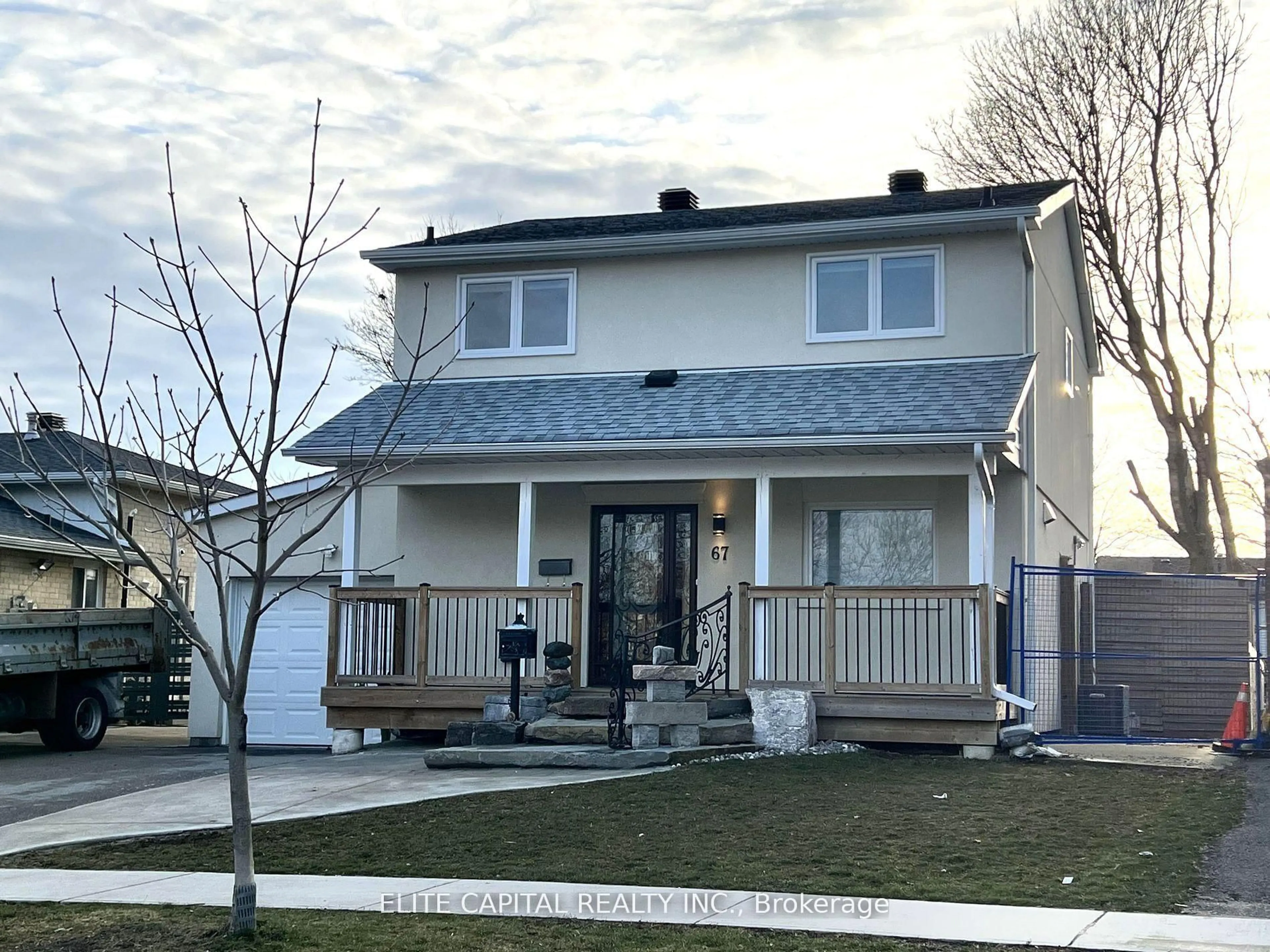 Home with vinyl exterior material, street for 67 Hutcherson Sq, Toronto Ontario M1B 1C5