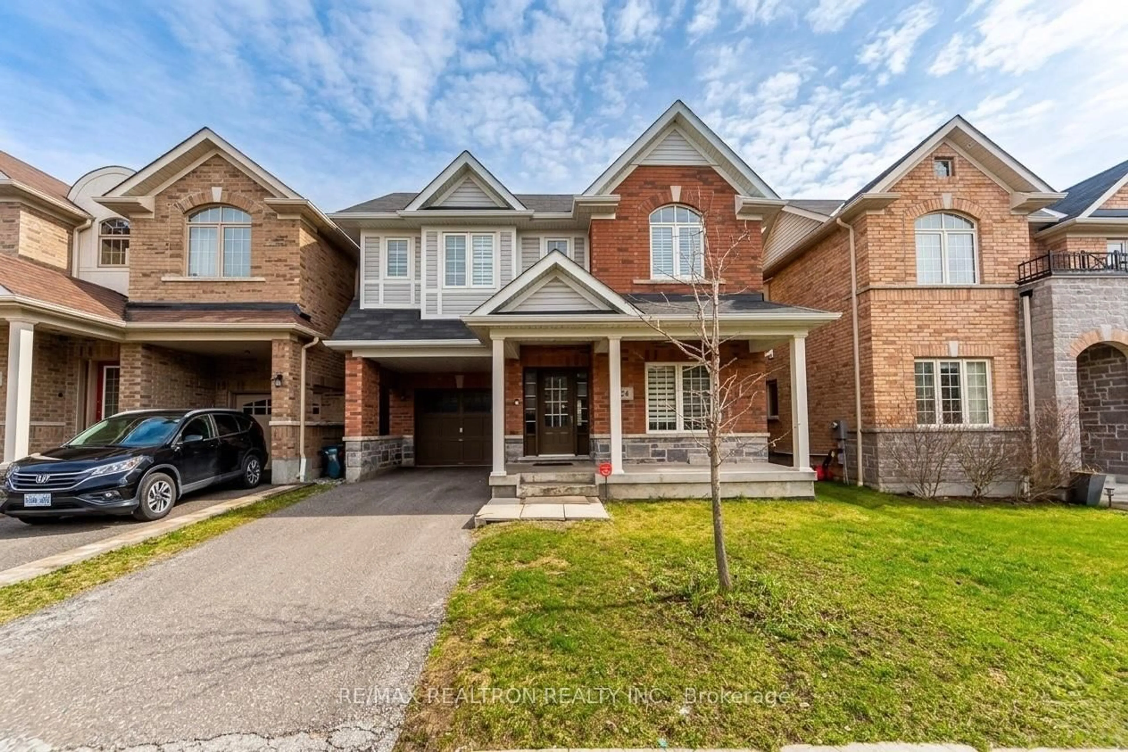 Home with brick exterior material, street for 24 Skelton Cres, Ajax Ontario L1Z 0S2