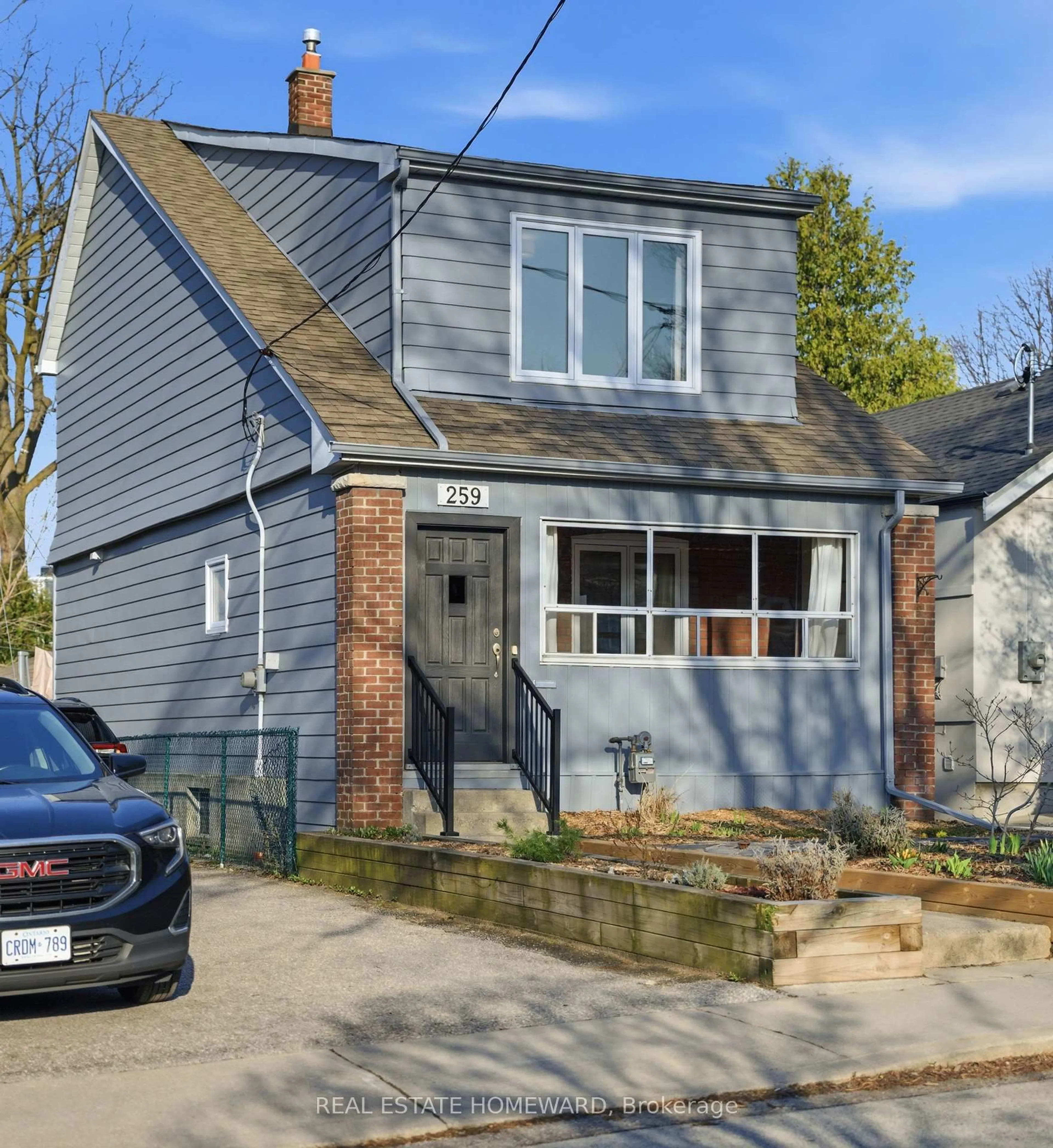 Home with brick exterior material, street for 259 Woodmount Ave, Toronto Ontario M4C 4A2