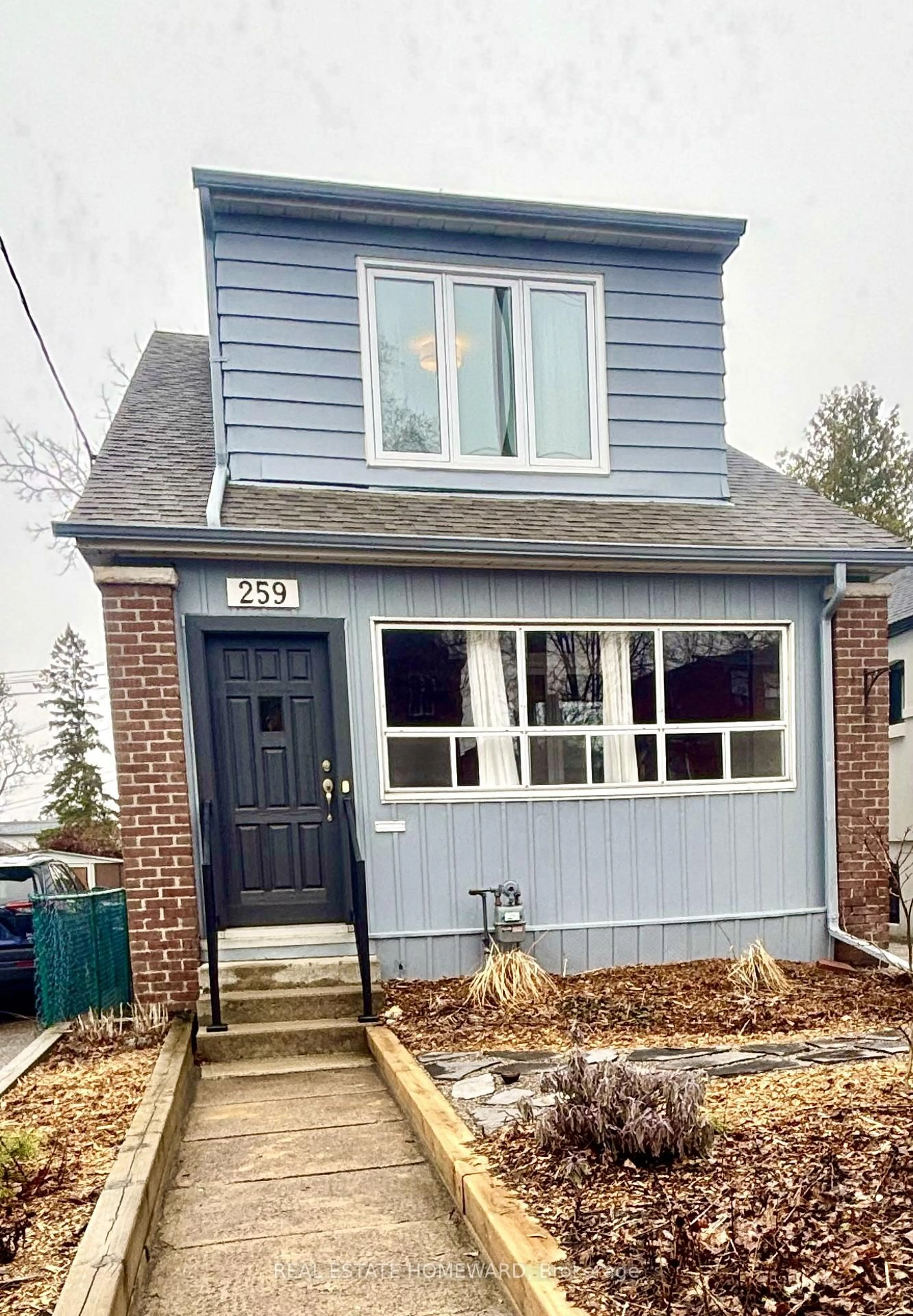 Home with vinyl exterior material, street for 259 Woodmount Ave, Toronto Ontario M4C 4A2